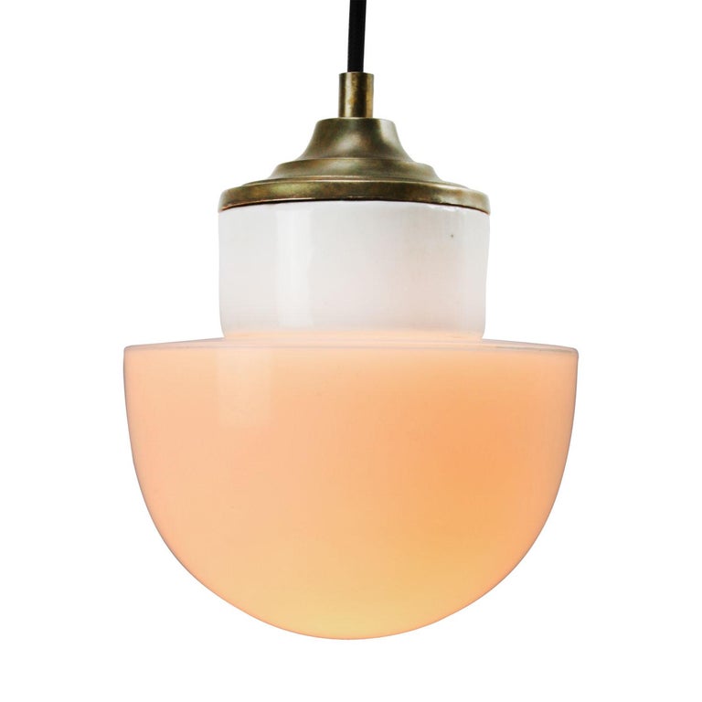 Porcelain industrial hanging lamp.
White porcelain, brass and opaline glass.
2 conductors, no ground.

Weight: 2.00 kg / 4.4 lb

Priced per individual item. All lamps have been made suitable by international standards for incandescent light bulbs,