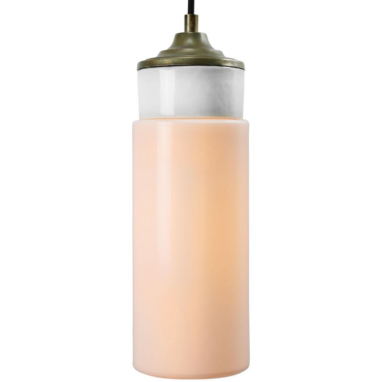 Porcelain industrial hanging lamp.
White porcelain, brass and Opaline glass.
2 conductors, no ground.

Weight: 1.40 kg / 3.1 lb

Priced per individual item. All lamps have been made suitable by international standards for incandescent light bulbs,