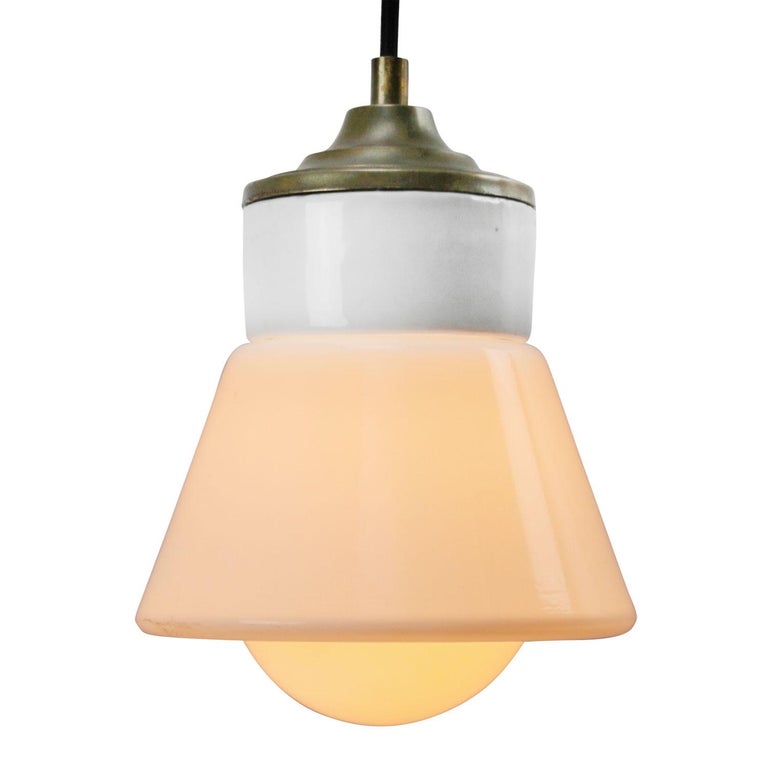 Porcelain Industrial hanging lamp.
White porcelain, brass and opaline glass.
2 conductors, no ground.

Weight: 2.00 kg / 4.4 lb

Priced per individual item. All lamps have been made suitable by international standards for incandescent light