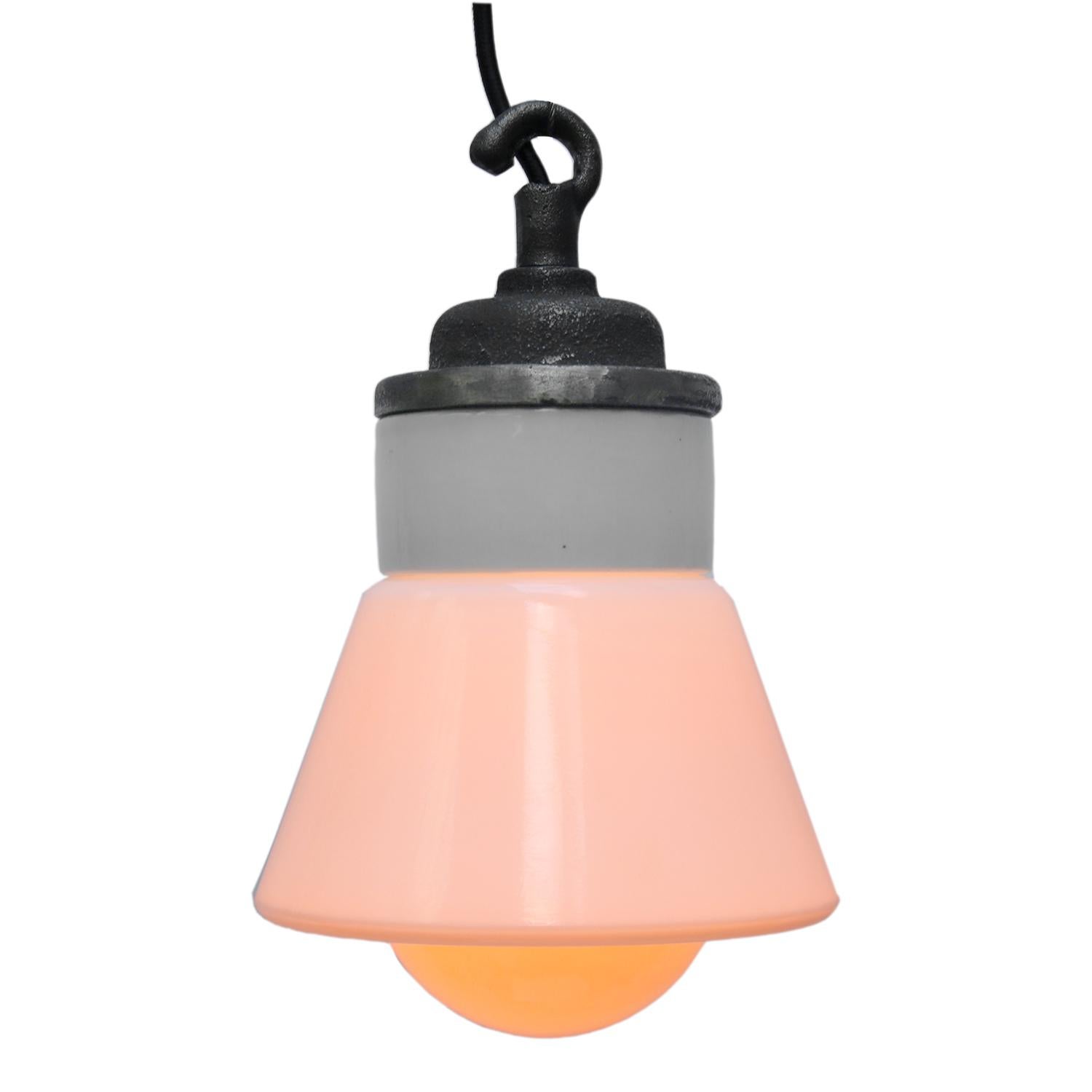 Porcelain Industrial hanging lamp.
White porcelain, cast iron and opaline glass.
2 conductors, no ground.

Weight: 2.00 kg / 4.4 lb

Priced per individual item. All lamps have been made suitable by international standards for incandescent