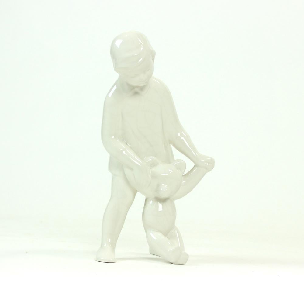 Ceramic White Porcelain Sculpture Of A Girl With A Teddybear, Czechoslovakia For Sale