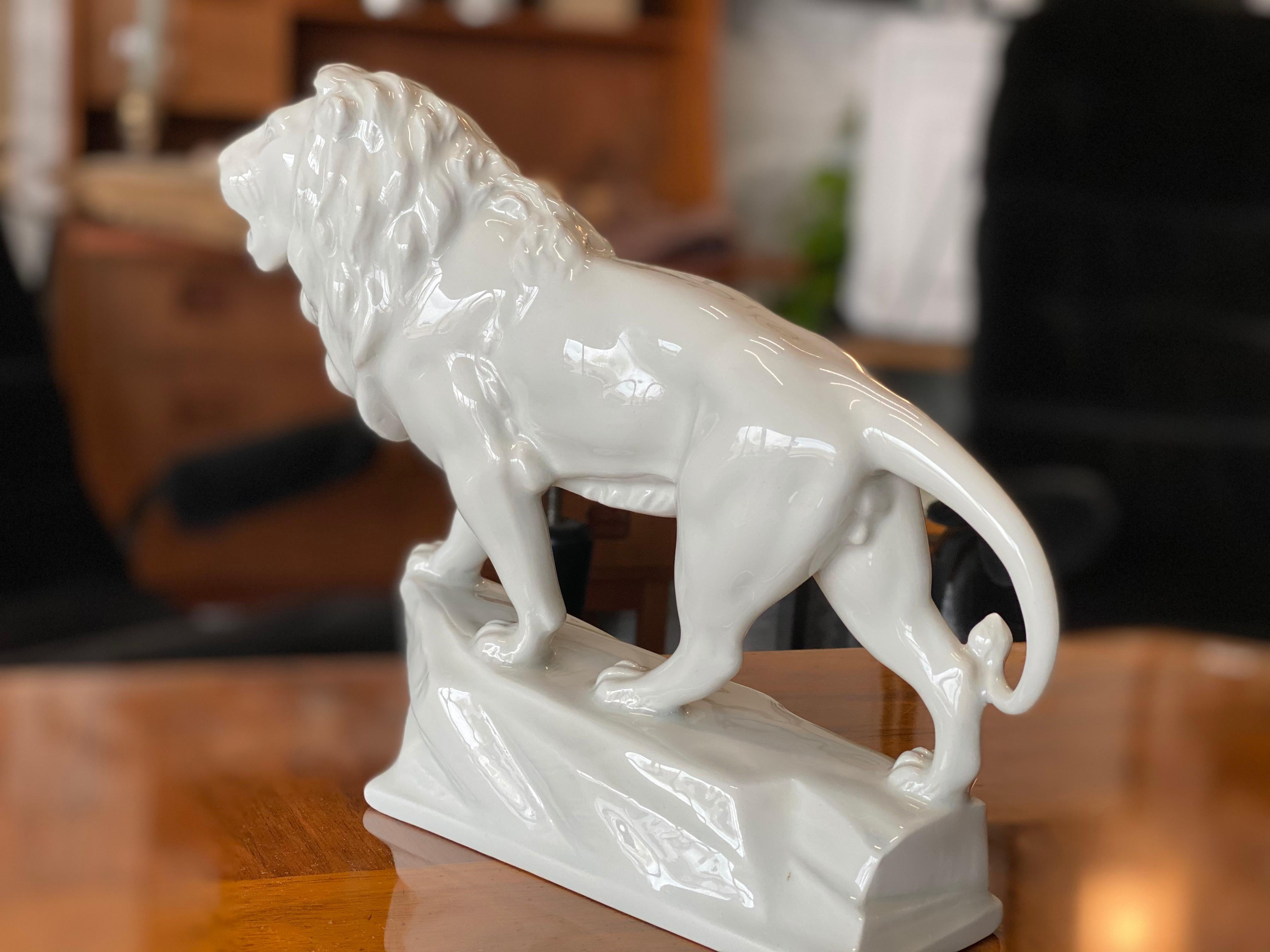 Art Deco White Porcelain Sculpture of a Lion, Mid 20th Century