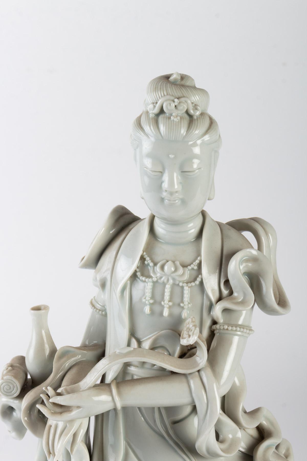 White Porcelain Statuette of a Divinity and his child called 