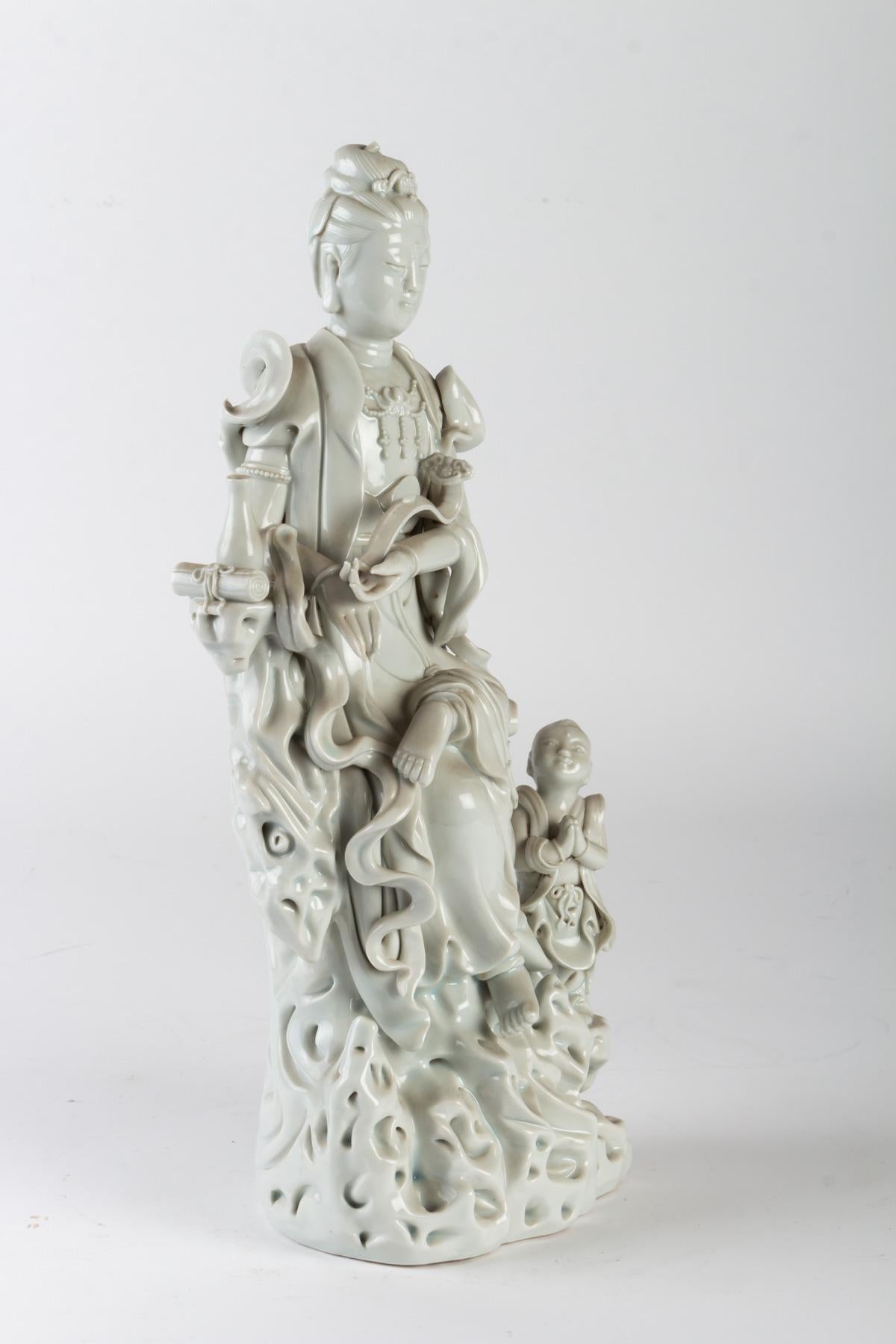 White Porcelain Statuette of a Divinity and His Child 1