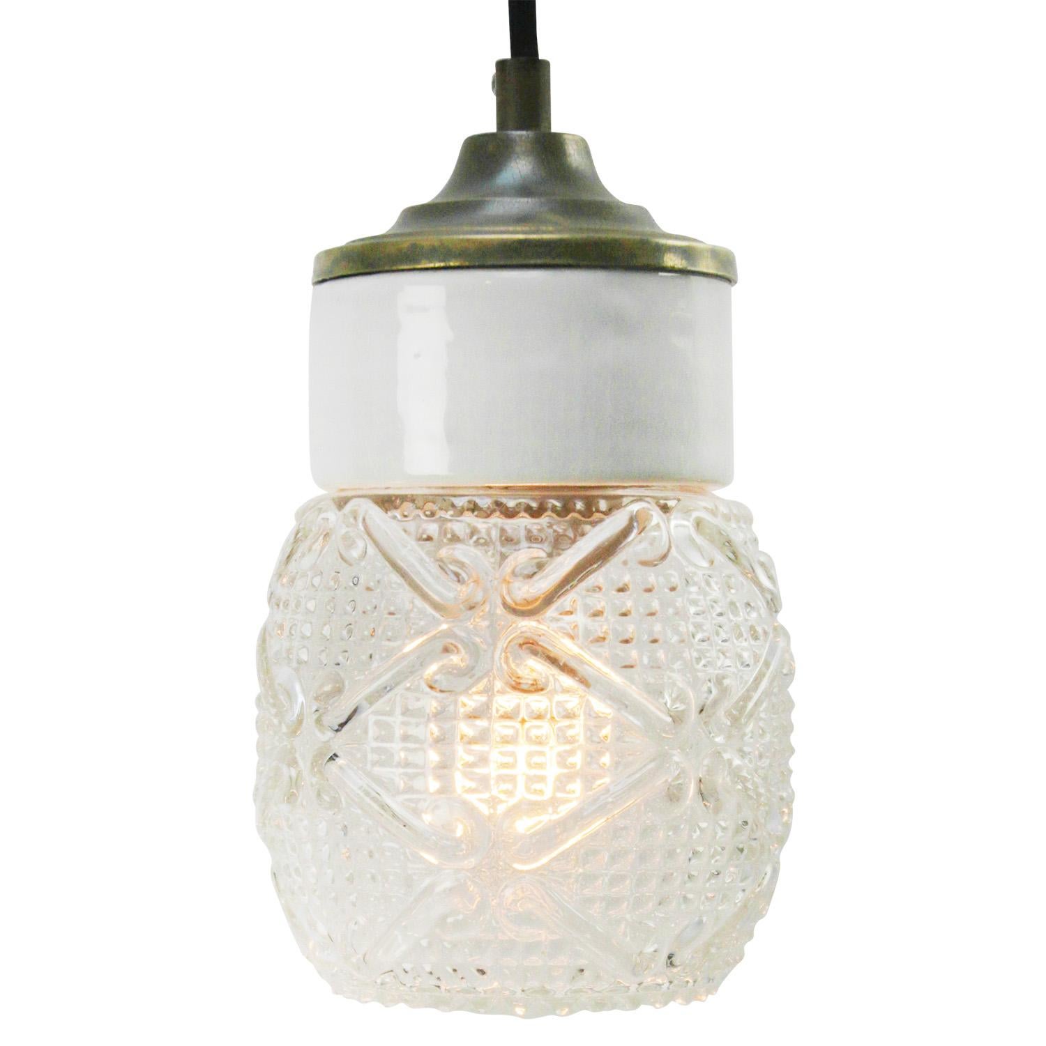 Porcelain industrial hanging lamp.
White porcelain, brass and clear striped glass.
2 conductors, no ground.

Weight: 1.56 kg / 3.4 lb

Priced per individual item. All lamps have been made suitable by international standards for incandescent