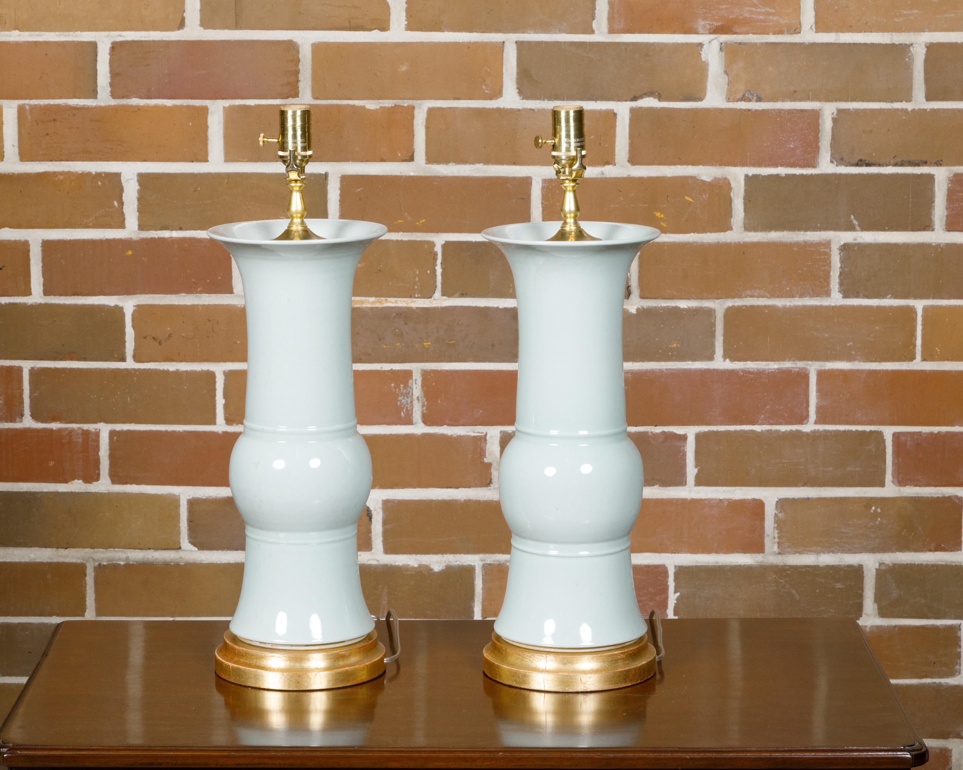 White Porcelain Table Lamps on Custom Giltwood Bases, a Pair Wired for the USA In Good Condition For Sale In Atlanta, GA