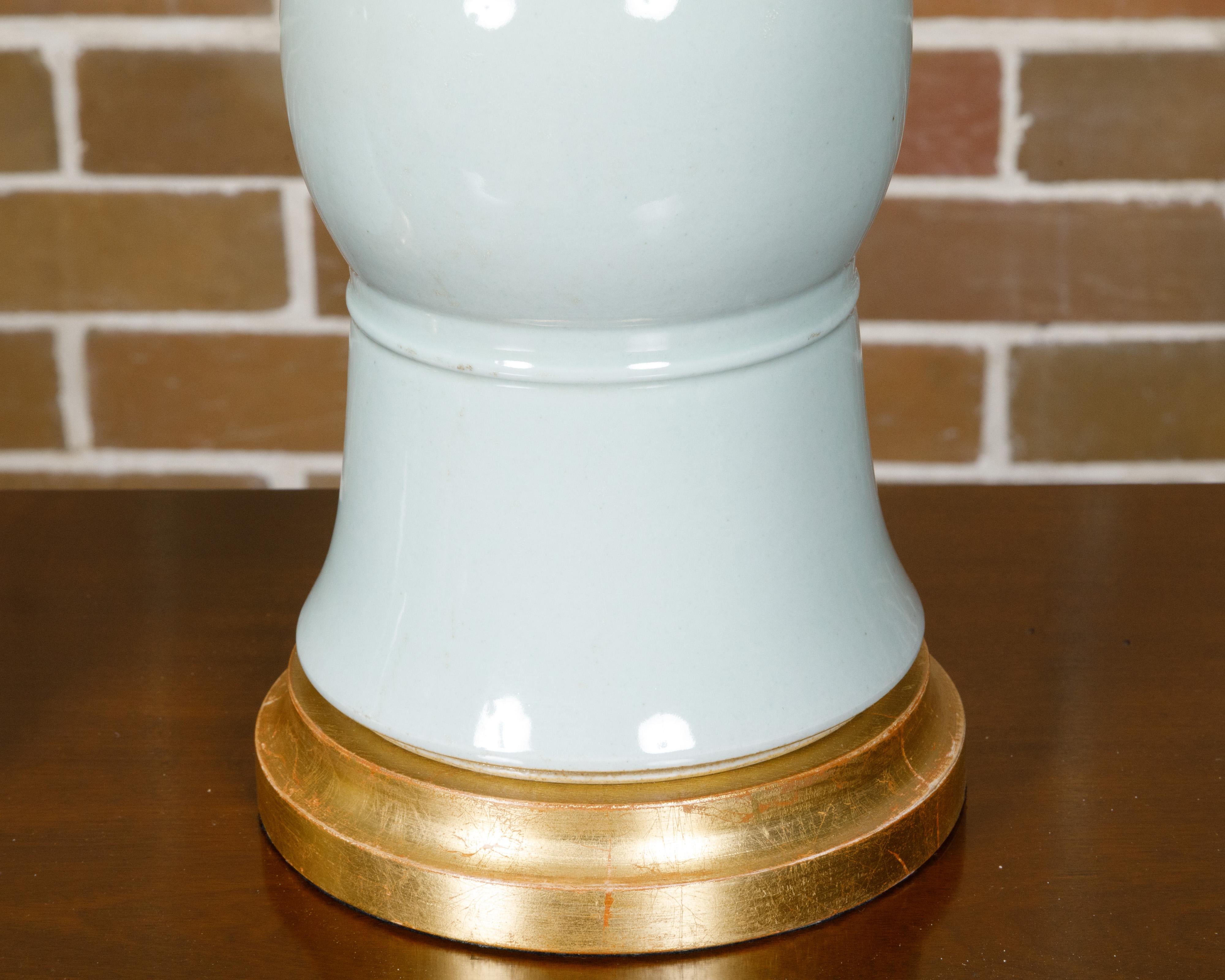 20th Century White Porcelain Table Lamps on Custom Giltwood Bases, a Pair Wired for the USA For Sale