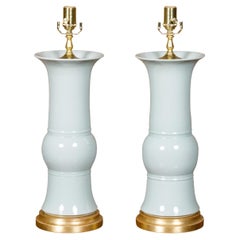 White Porcelain Table Lamps on Custom Giltwood Bases, a Pair Wired for the USA