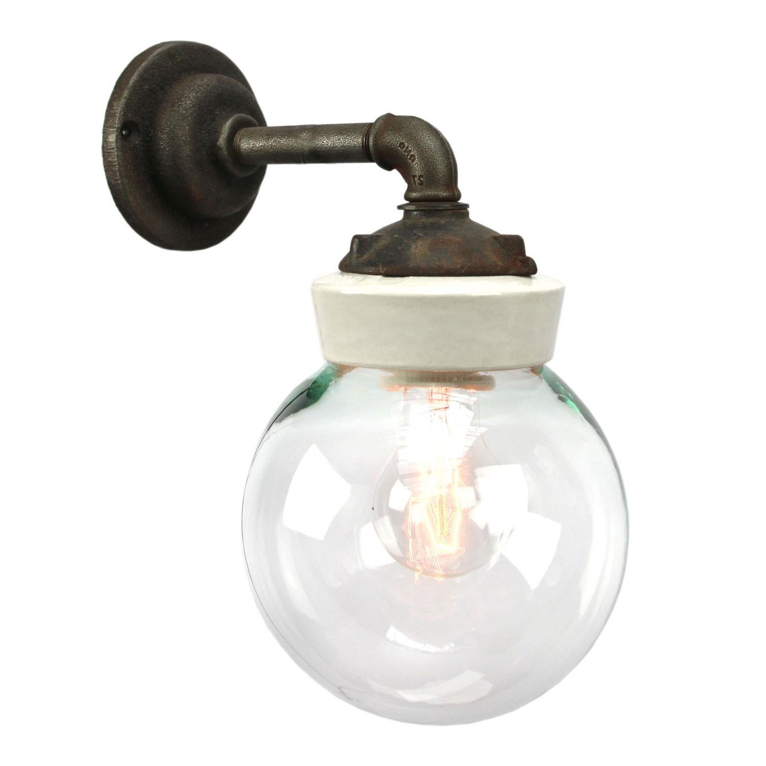 Porcelain Industrial wall lamp.
White porcelain, cast iron and clear glass.
2 conductors, no ground.

For use inside only

Measues: Weight: 2.05 kg / 4.5 lb

Priced per individual item. All lamps have been made suitable by international standards