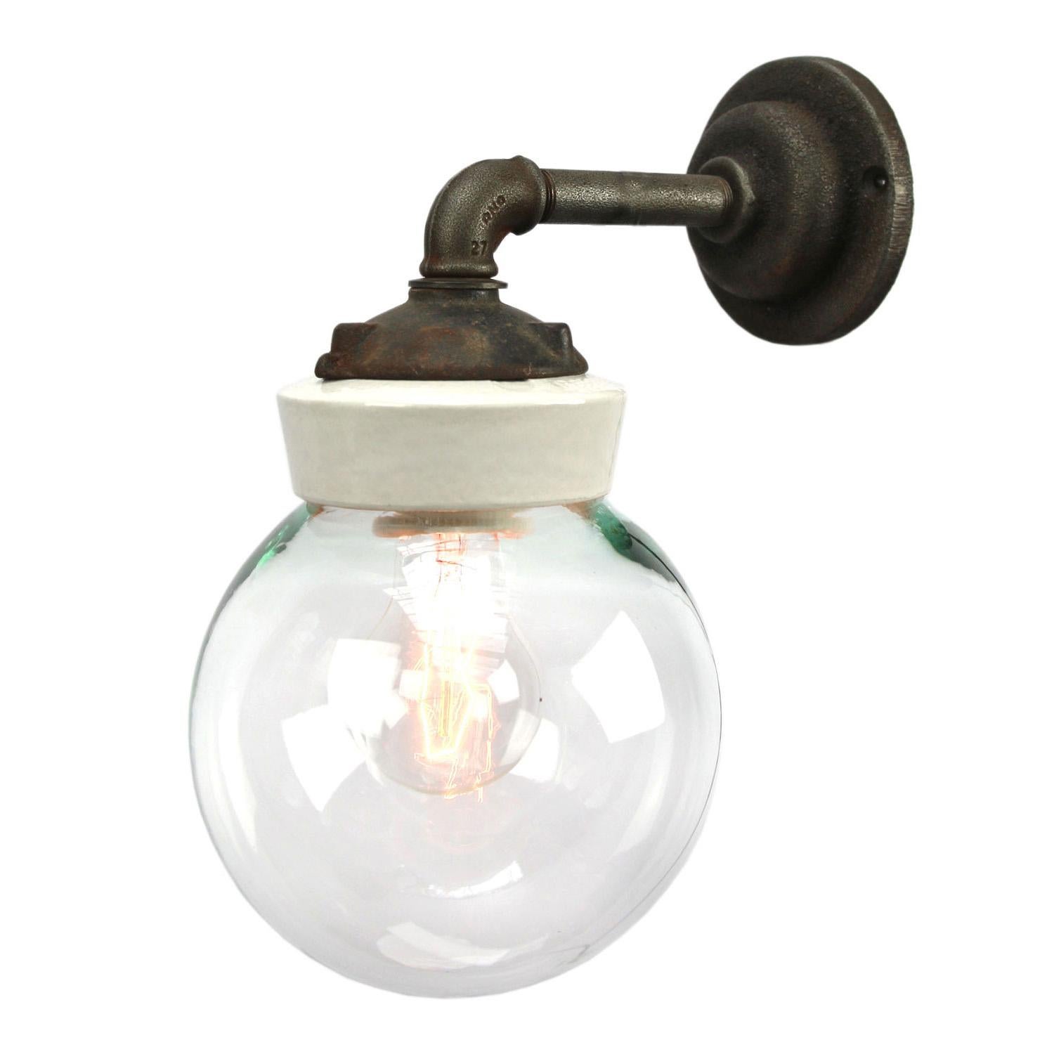 Porcelain Industrial wall lamp.
White porcelain, cast iron and clear glass.
2 conductors, no ground.

Diameter wall mount: 10.5 cm / 4”. 2 holes to secure.

For use inside only

Weight: 2.05 kg / 4.5 lb

Priced per individual item. All lamps have