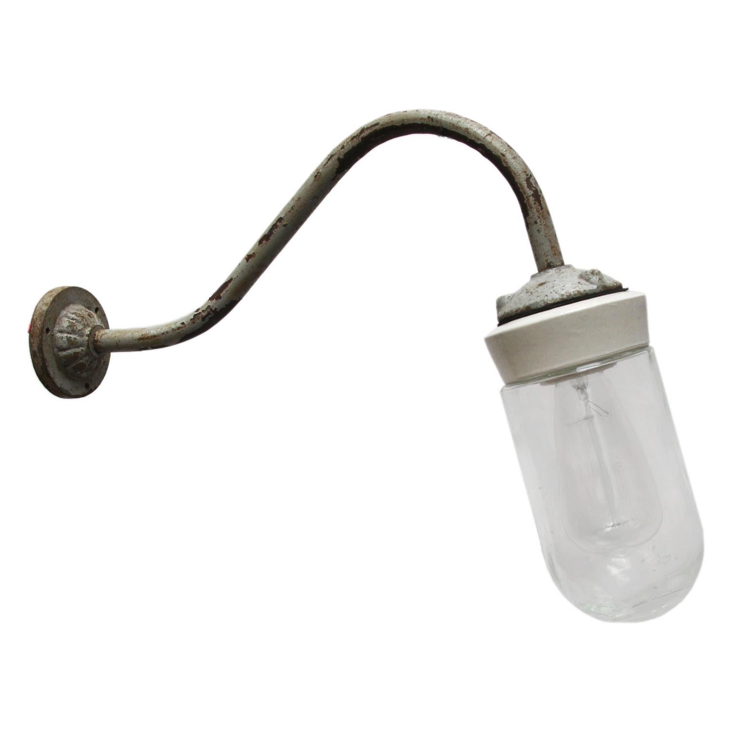 Vintage industrial wall light.
Cast iron and porcelain top. Clear glass.
Diameter cast iron wall mount: 9 cm, three holes to secure.

Weight: 2.0 kg / 4.4 lb

Priced per individual item. All lamps have been made suitable by international standards