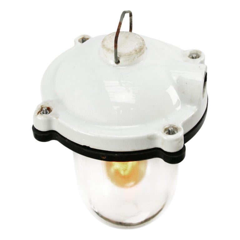 Industrial pendant.
White porcelain, clear glass.
2 conductors, no ground.

Weight: 1.80 kg / 4 lb

Priced per individual item. All lamps have been made suitable by international standards for incandescent light bulbs, energy-efficient and LED