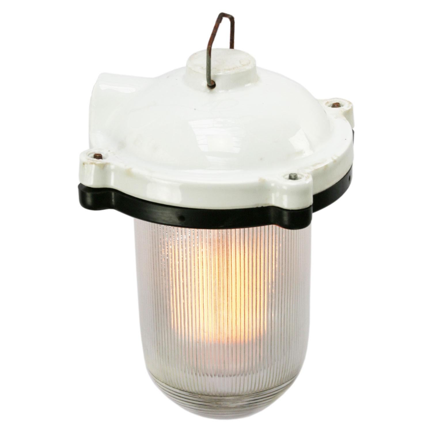 Industrial pendant.
White porcelain, clear Holophane glass.
2 conductors, no ground.

Weight: 1.80 kg / 4 lb

Priced per individual item. All lamps have been made suitable by international standards for incandescent light bulbs, energy-efficient and