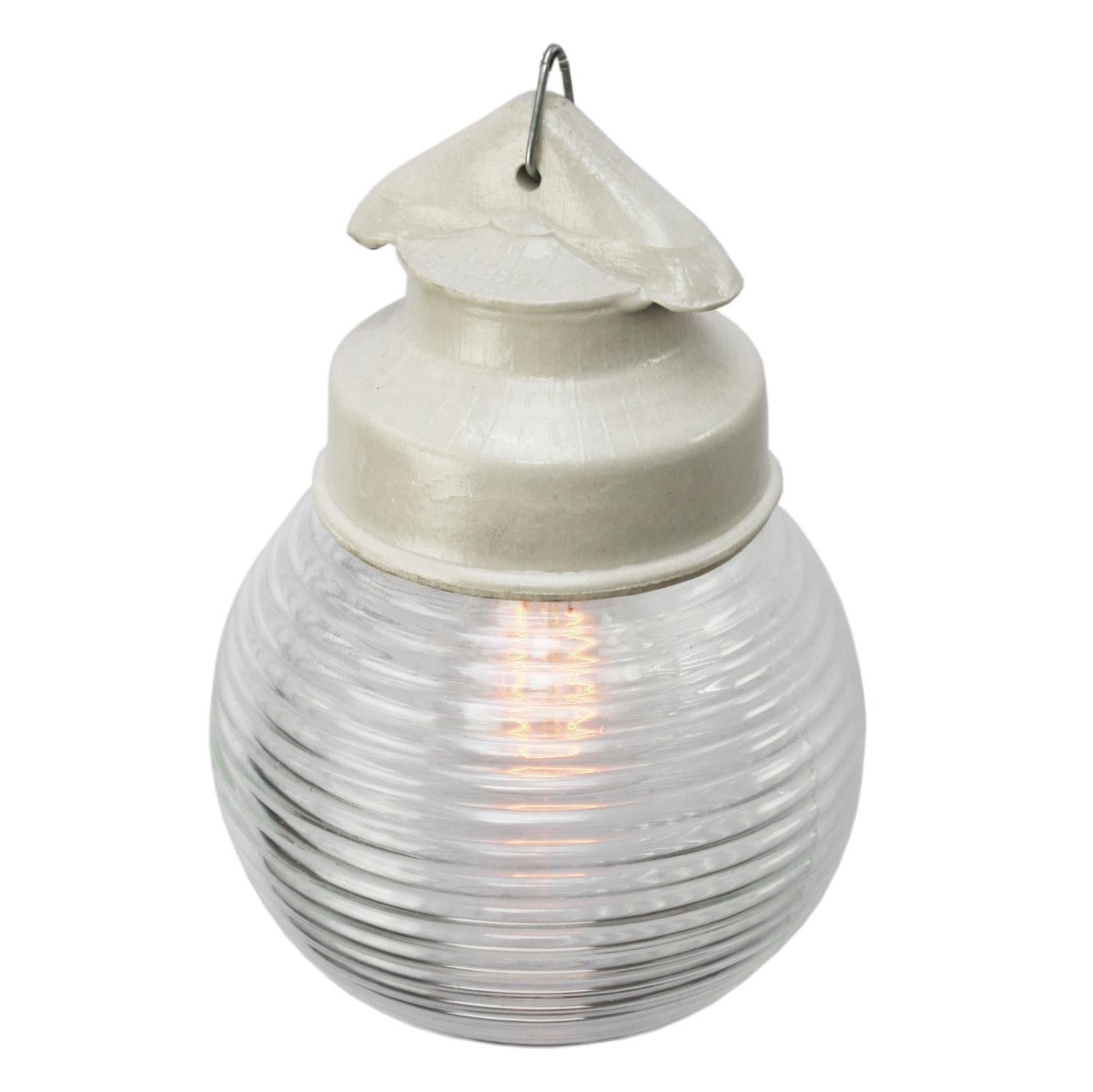 Industrial pendant.
White porcelain, clear glass.
2 conductors, no ground.

Weight: 1.06 kg / 2.3 lb

Priced per individual item. All lamps have been made suitable by international standards for incandescent light bulbs, energy-efficient and