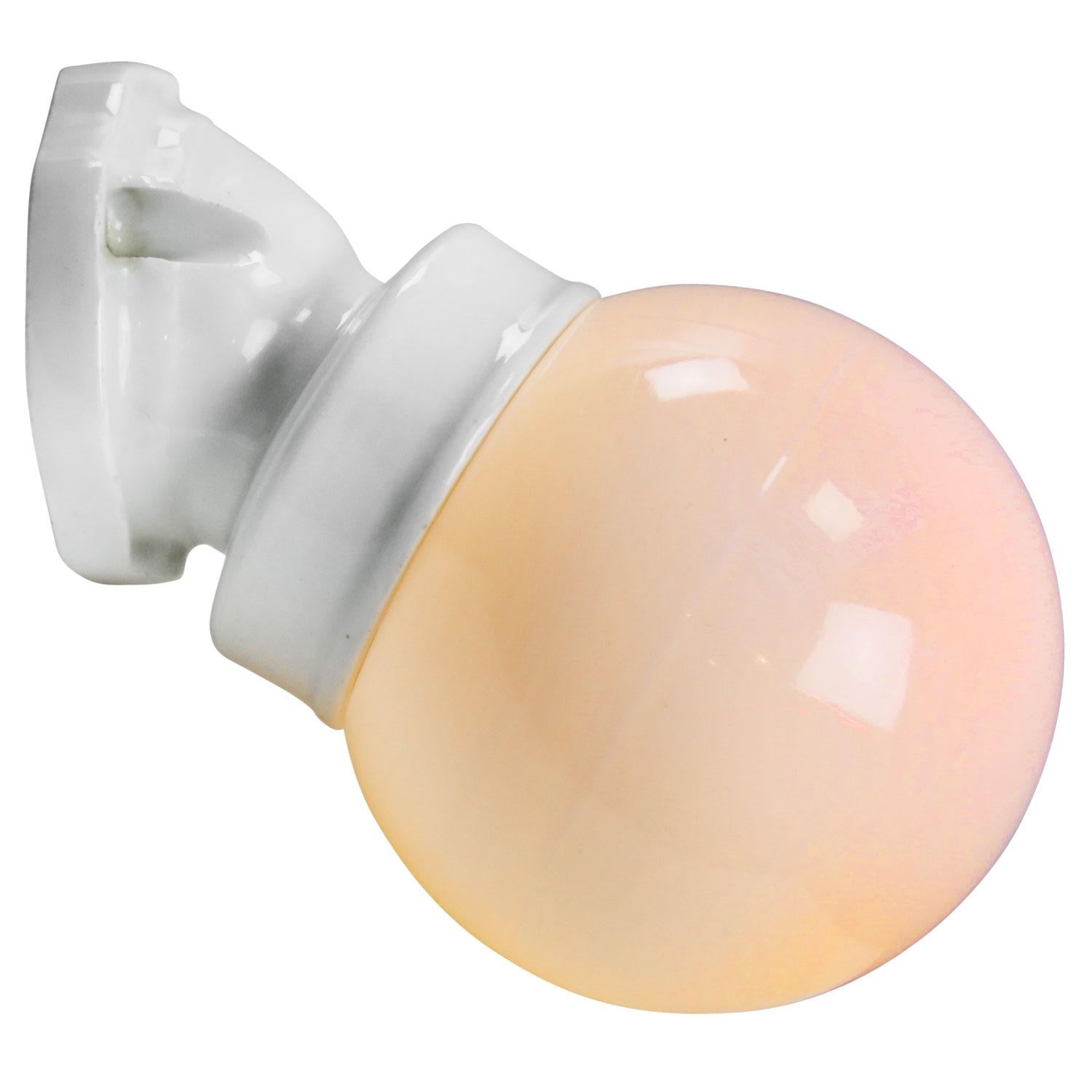 Industrial wall lamp or scone. White porcelain. White opaline milk glass.
2 conductors. No ground.

Weight: 0.60 kg / 1.3 lb

Priced per individual item. All lamps have been made suitable by international standards for incandescent light bulbs,