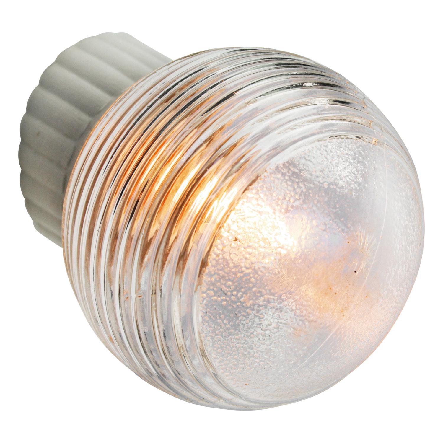 Industrial wall lamp.
White porcelain, striped glass.
2 conductors, no ground.

Weight: 0.96 kg / 2.1 lb

Priced per individual item. All lamps have been made suitable by international standards for incandescent light bulbs, energy-efficient