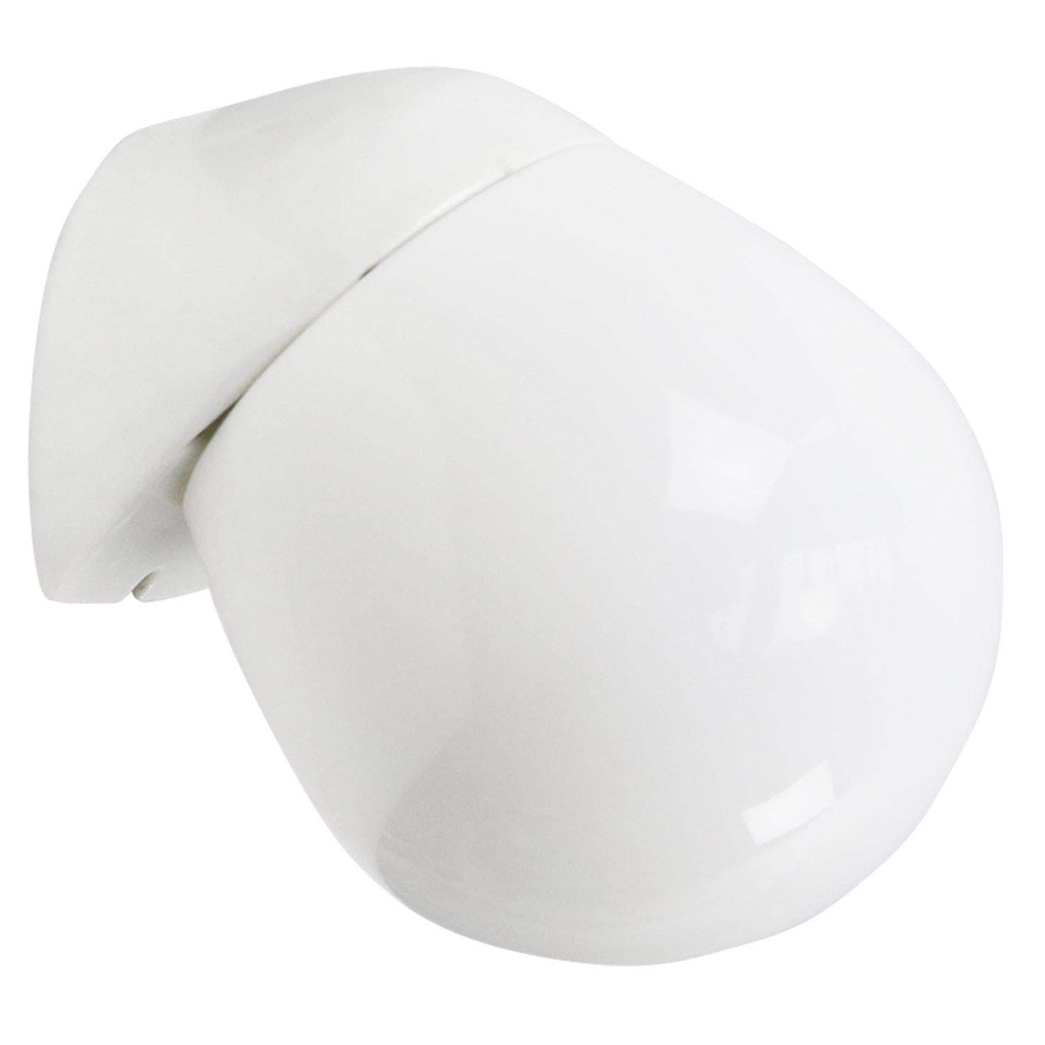 Porcelain wall lamp / scone by Lindner no. 6010
Designed by Wilhelm Wagenfeld
White porcelain, white opaline glass.

2 Conductors, no earth wire.
Suitable for 120 volt USA
New wiring is UL listed (110 volt) or CE certified (220 volt) 

Weight: 0.80