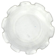 White Pottery Bowl with Ruffled Edge