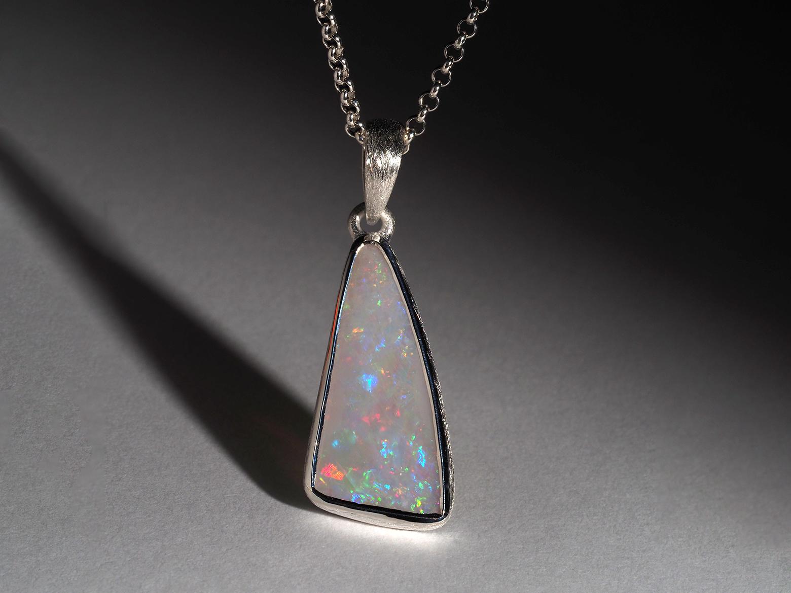 Silver pendant with natural White Precious Opal
gemstone origin - Australia
Opal weight - 3.25 ct
gem size is 12 x 29 mm
pendant length - 35 mm
pendant weight - 2.50 grams
The necklace comes with a silver chain. 