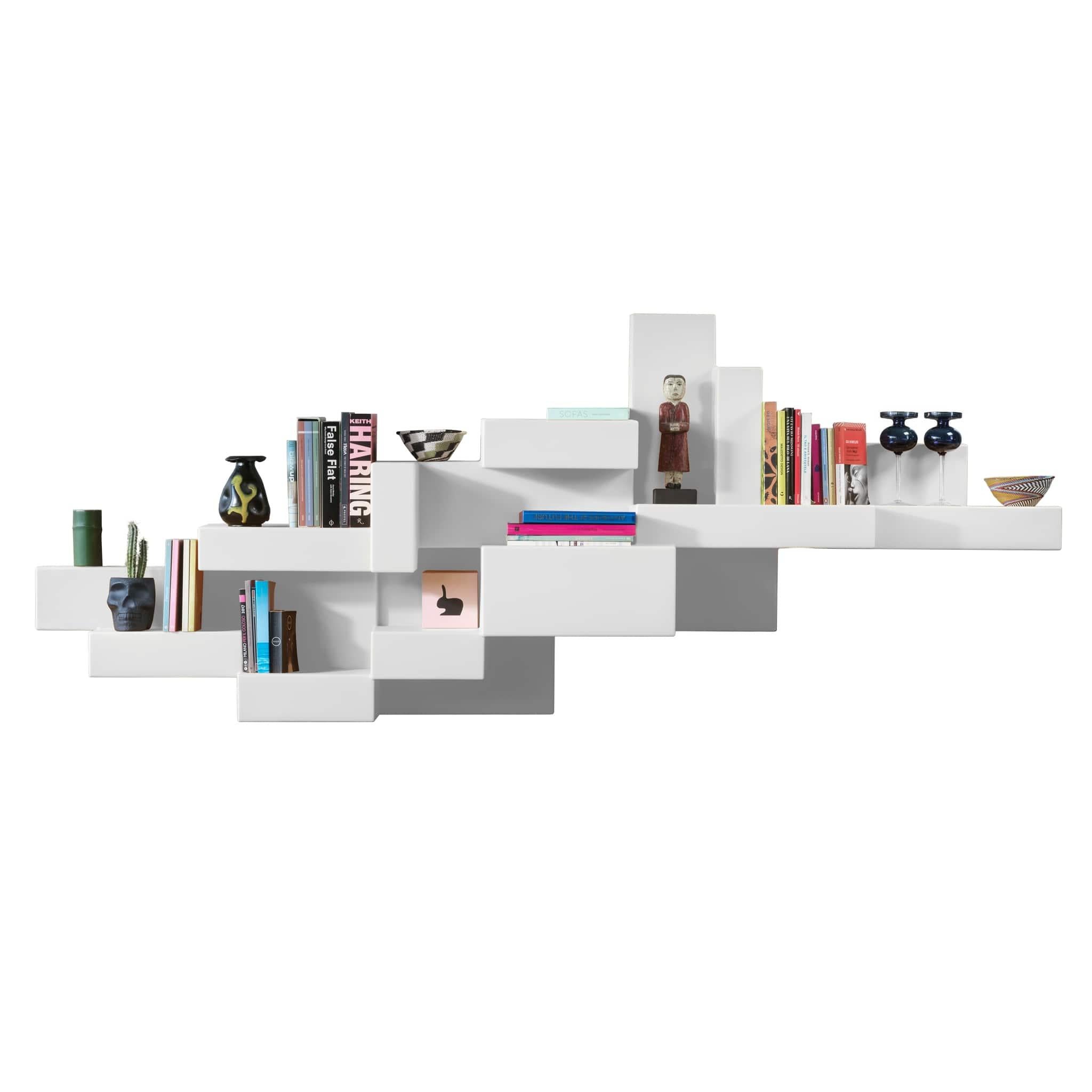 The Primitive bookshelf was one of the strongest and most iconic products designed by Studio Nucleo. Initially made as a limited-edition product, this bookshelf is now industrialized by Qeeboo and re-proposed in a polyethylene version with