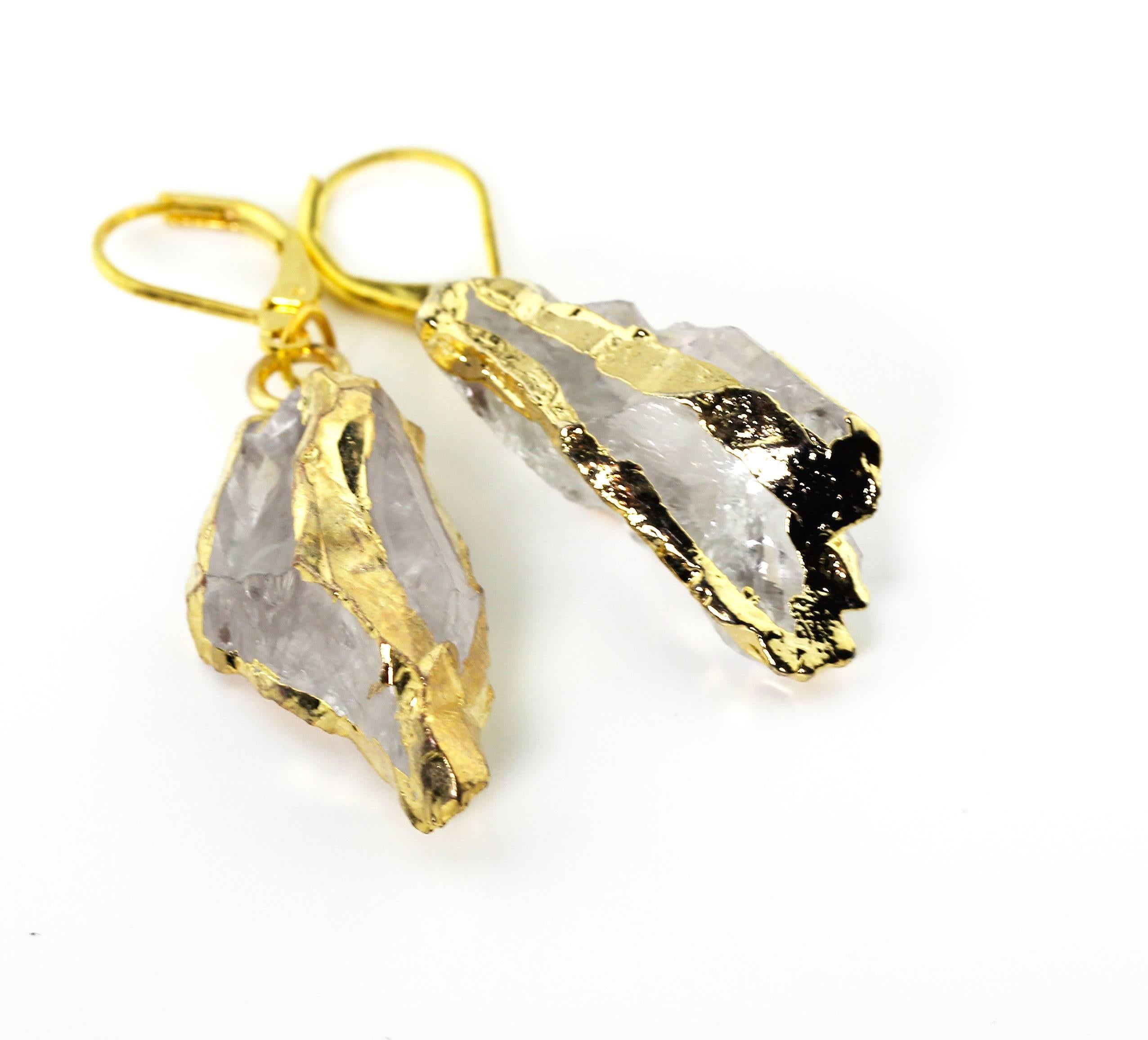 Bright translucent natural White Quartz polished rock dangling gold plated lever-back earrings.  They hang approximately 2 inches long and glitter happily from daytime to evening.