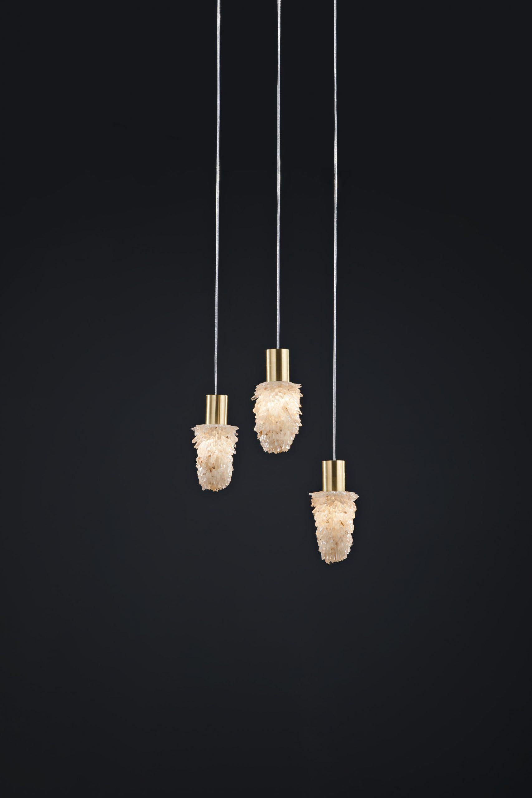 White Quartz pendant lamp By Aver
Dimensions: D 10 x W 10 x H 15 cm
Materials: White Quartz, metal.
Also Available: silver leaf, antique silver leaf, gold leaf, brass leaf, copper leaf, pink gold leaf.

All our lamps can be wired according to