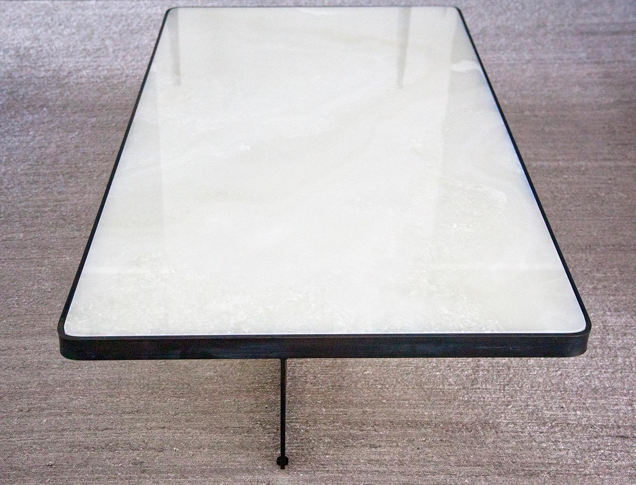 Modern White Quartzite Coffee Table with Blackened Steel Cross Base For Sale