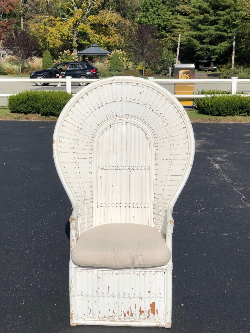 White split bamboo and rattan peacock chair. Perfect statement piece for porch or anywhere. Boho chic coastal feel. Cushion is not original and we recommend a better fitted one. We can touch up the white paint in areas of misses.