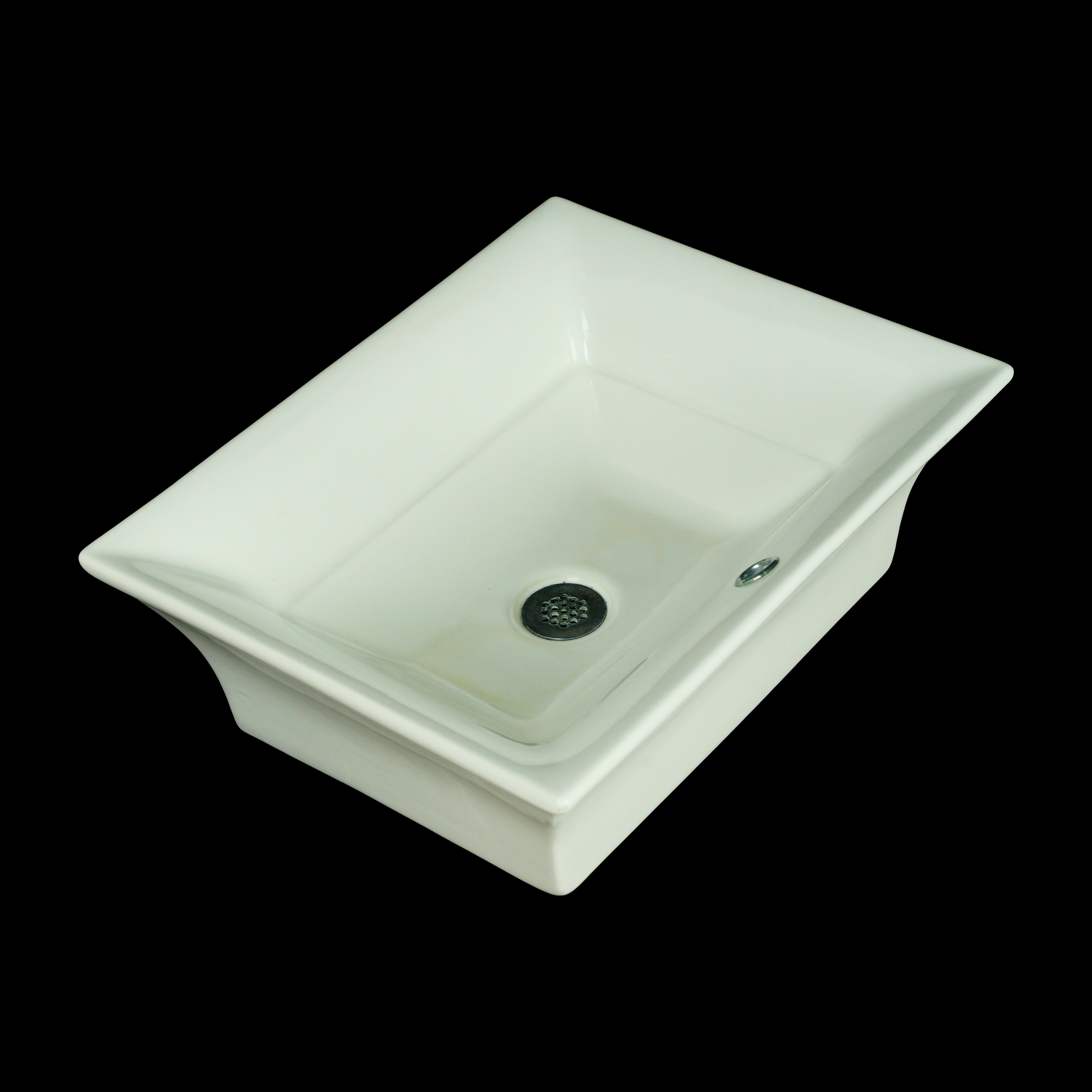 Rectangular white ceramic countertop pedestal sink with the original brass brass hardware. Stamped 11 OTT 1999. This piece was acquired from an estate located in Greenwich, Connecticut. Good condition with surface wear from prior use. One available.