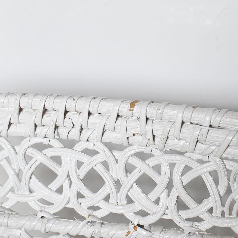 A beautiful mid-century white wicker wastebasket. 

Measures: 11.5