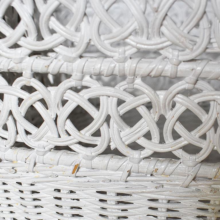 white wicker wastebasket