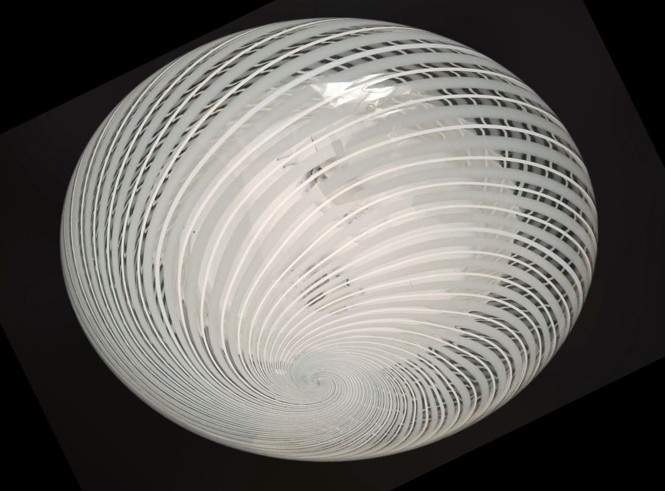 Elegant vintage Italian flush mount with a single clear Murano glass shade hand blown with thick and thin milky white ribbing / Made in Italy by Venini, circa 1960s
Measures: diameter 19 inches, height 7.5 inches
2 lights / E26 or E27 type / max 60W