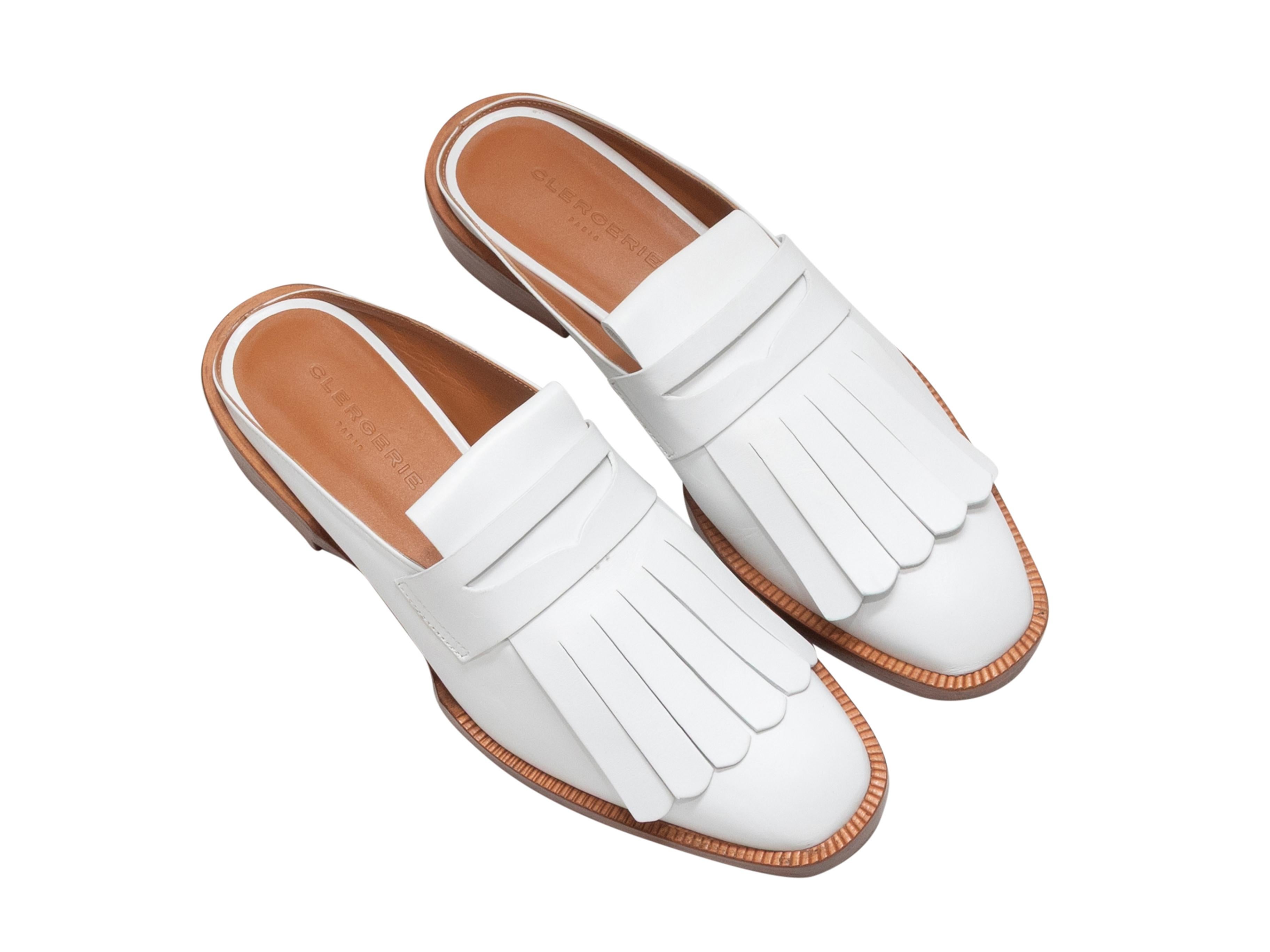Mules en cuir blanc de Robert Clergerie. Talons à hauteur d'homme. Hauteur de talon de 1