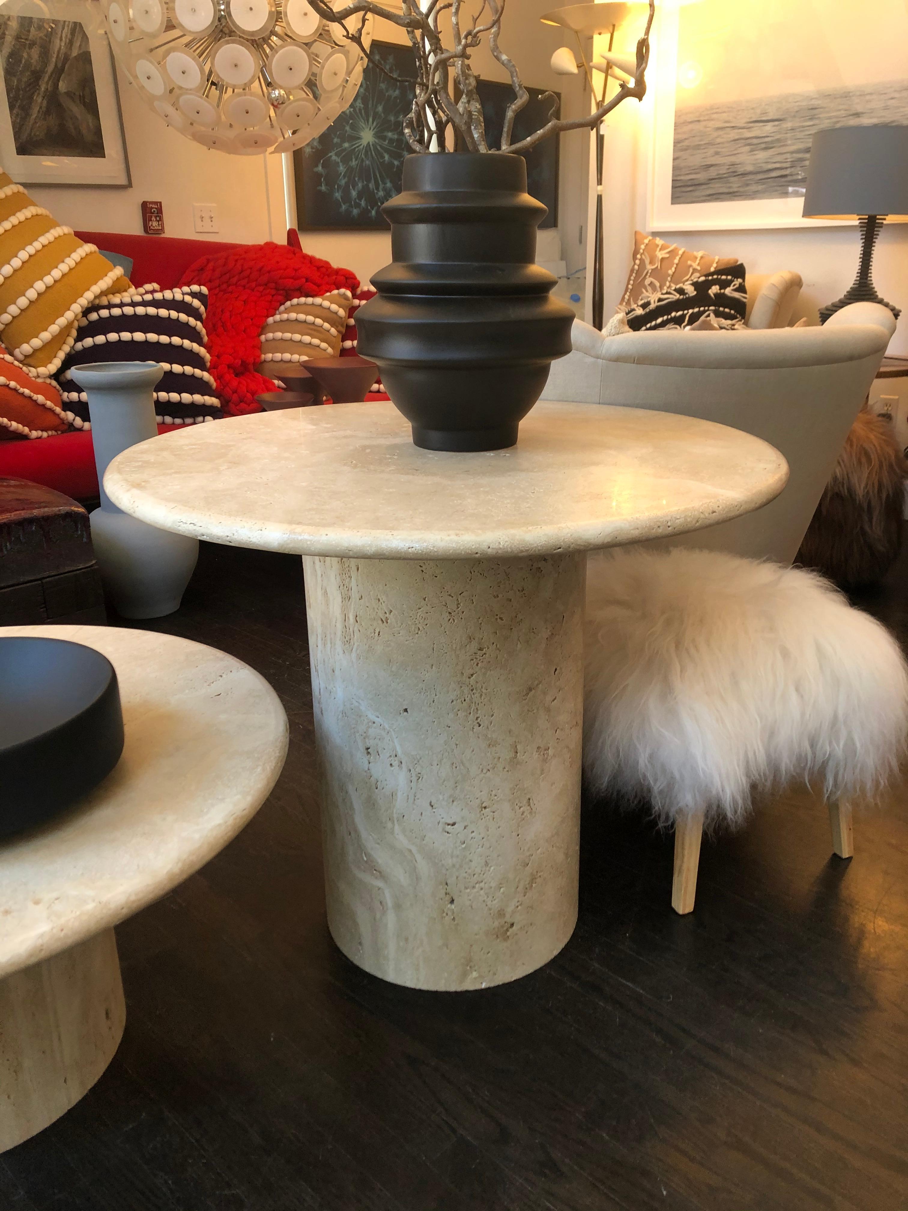 White Roman travertine bistro table by Le Lampade
Round travertine top supported by a travertine column shaped base. These tables can be custom made.