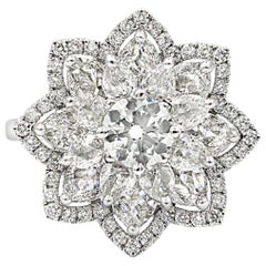 White Rose Cut Diamond and Round Brilliant Diamond Ring in 18 Karat Gold