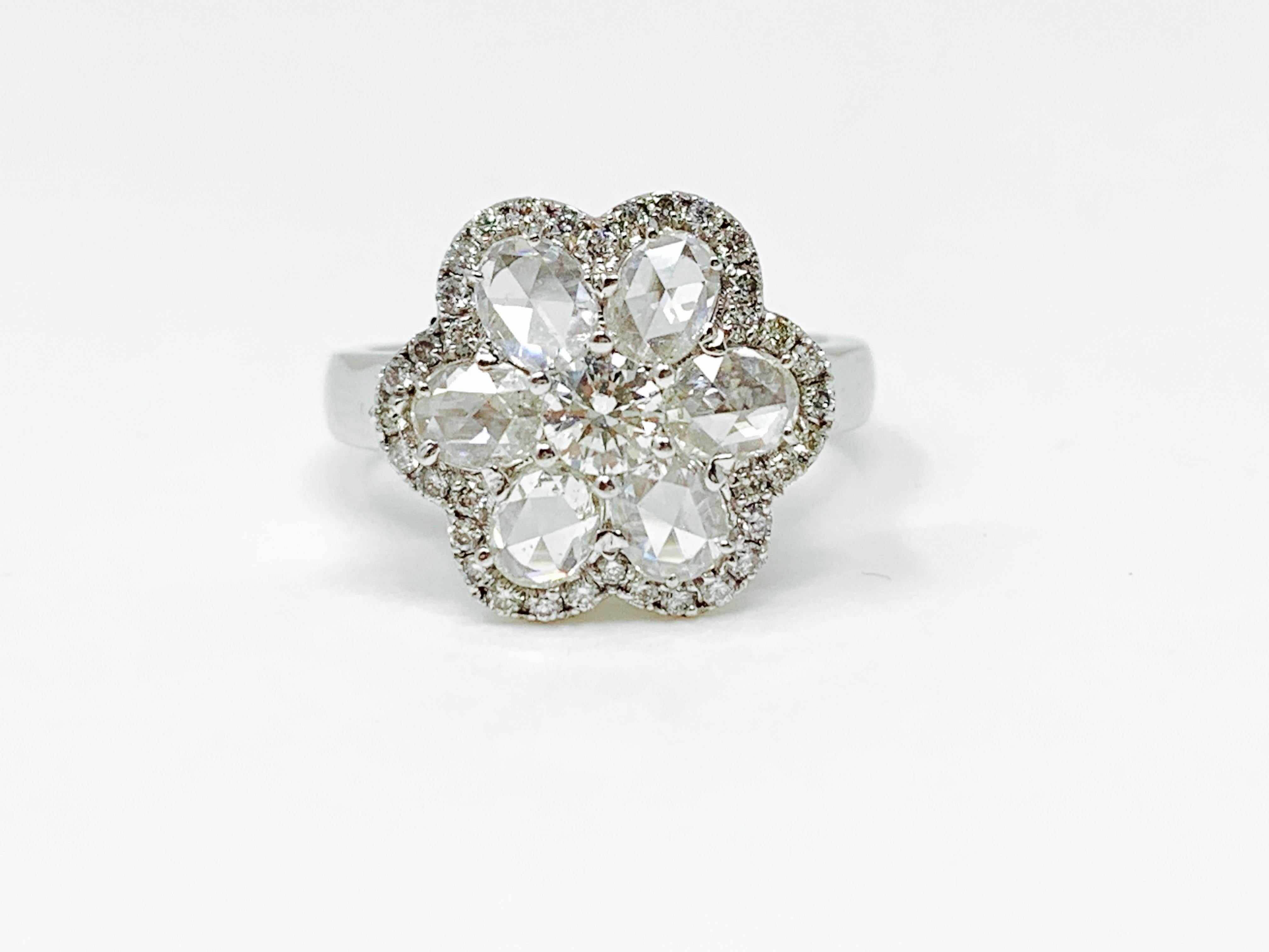 Moguldiam Inc White rose cut diamond engagement ring handmade in 18 k white gold .
The details are as follows : 
Diamond weight : 2.70 carat 
Metal : 18 k white gold 
Ring size : 6 1/2 