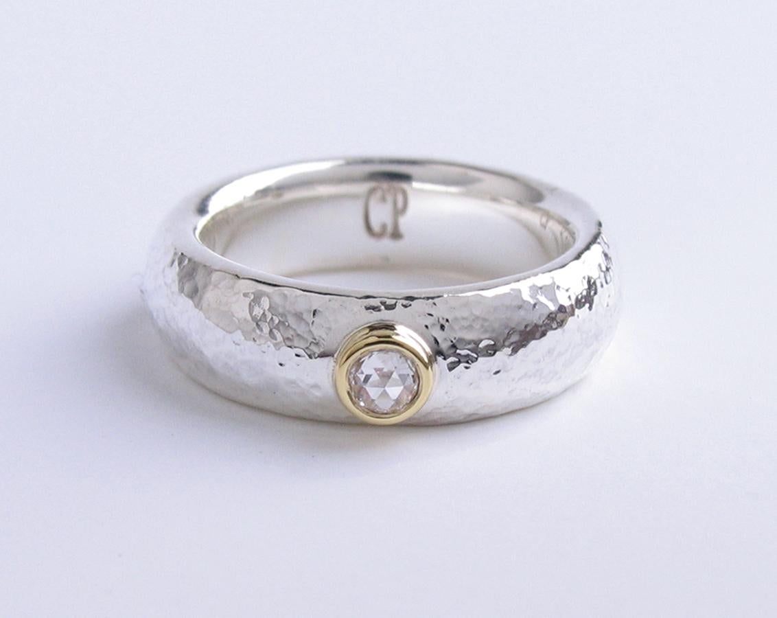 White rose cut diamond ring with sterling silver and 18k gold band, size 6 1/2. 
One of a kind, handmade by jewelry artist Christopher Phelan.
Diamond weight .080 carats, 3mm VS1 white rose cut diamond. 
Width of ring: 6.22 mm.