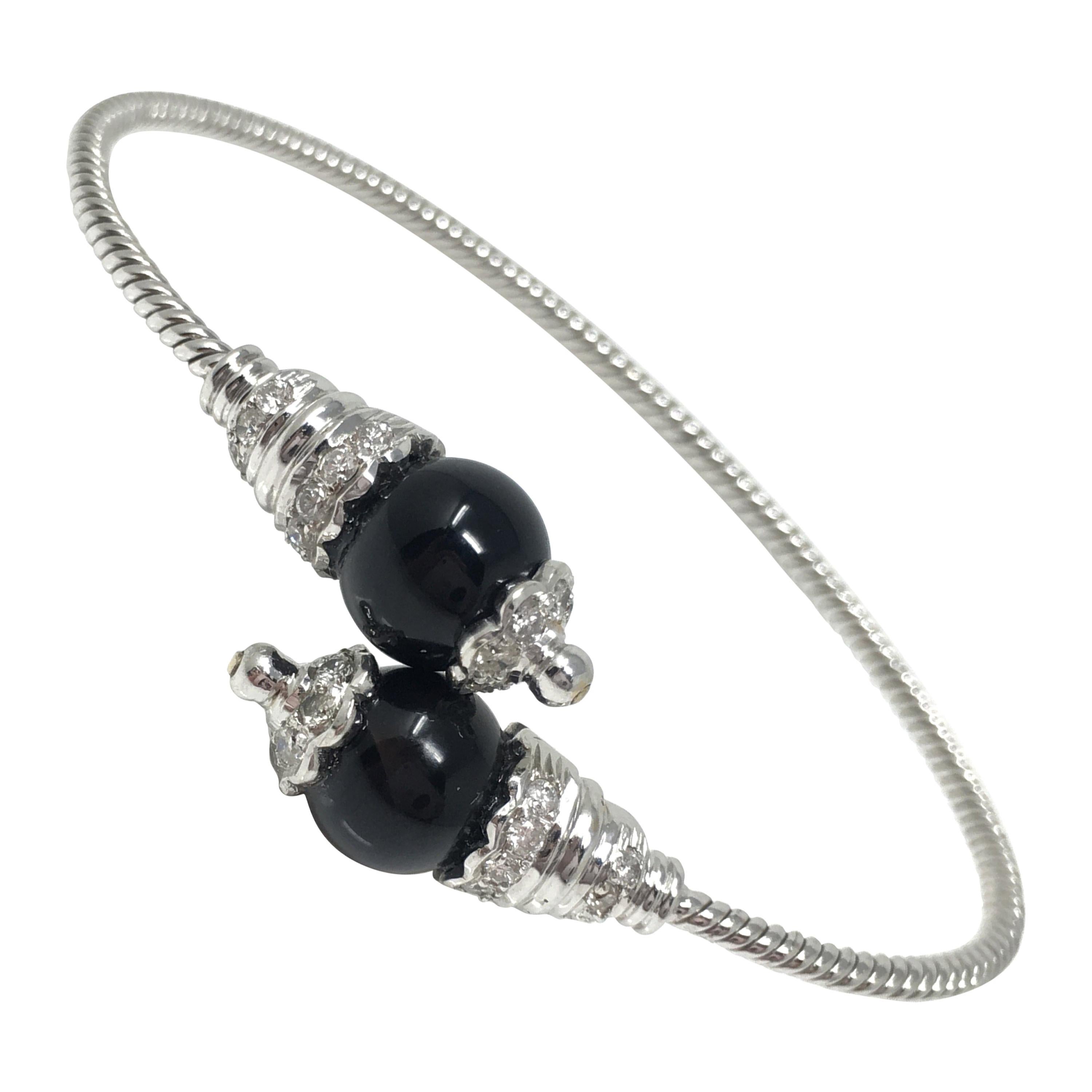 Bracelet souple en or blanc 18 carats avec brillants blancs et onyx en vente