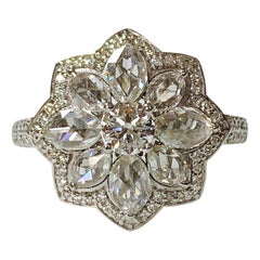 White Round Brilliant and Rose Cut Diamond Engagement Ring in 18 Karat Gold