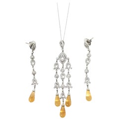 White Round Brilliant And Topaz Dangle Earrings And Matching Necklace In 18K.