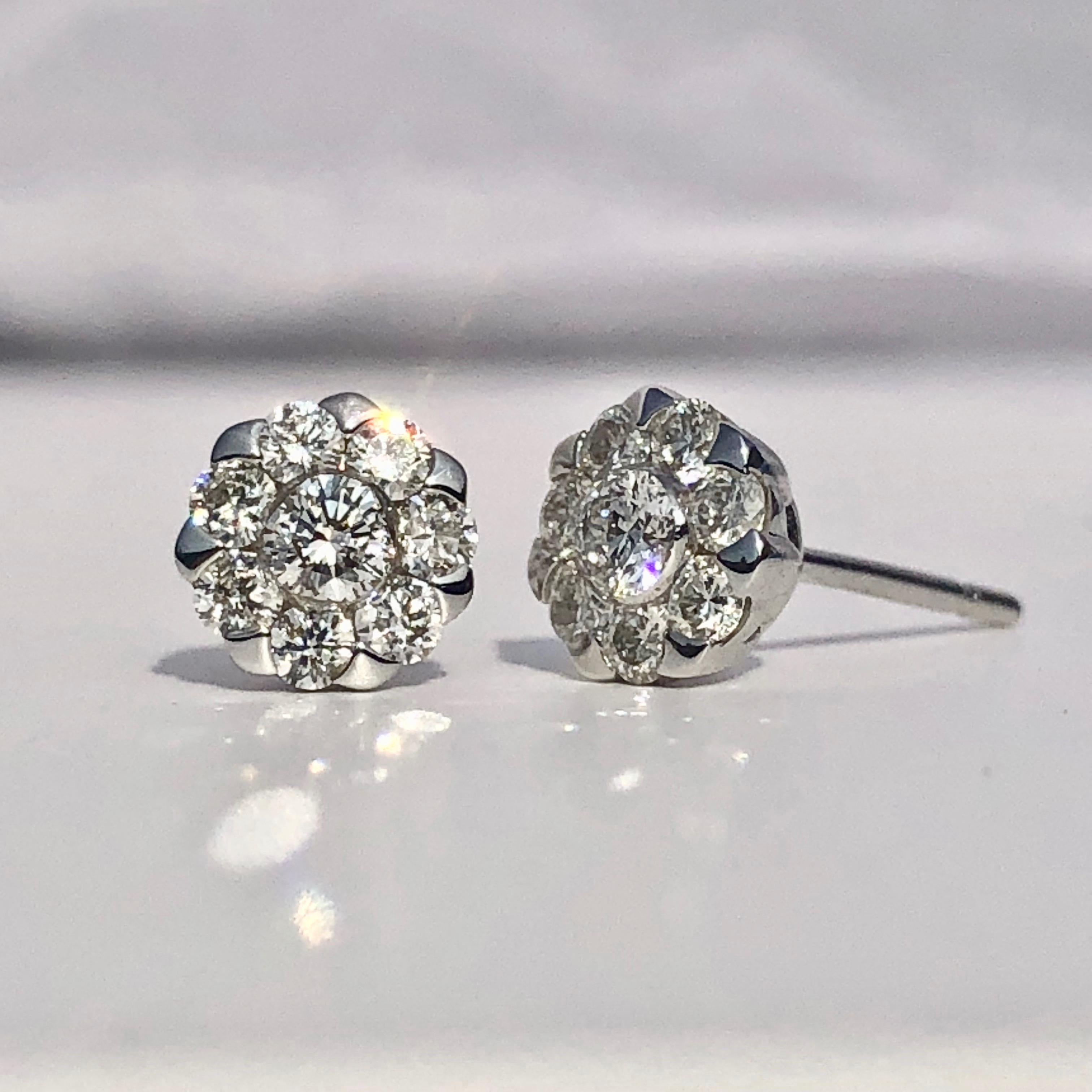 A Pair of 18k White Gold Round Brilliant Cut Diamond Studs

.57ct total weight G Colour SI Clarity - Very Bright And Lively 

6.69mm diameter 
3.54mm deep

Treat yourself or someone truly special to these breathtaking 18ct white gold diamond halo