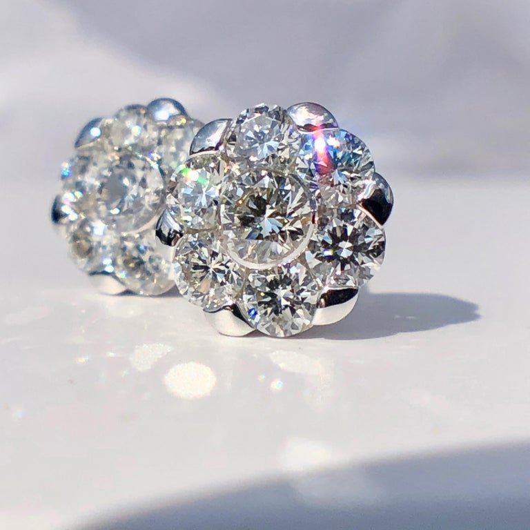 White Round Brilliant Cut Diamond Daisy Stud Earrings 18 Karat Gold .56