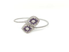 White Round Brilliant Diamond And Amethyst Flexible Bracelet In 18K White Gold.