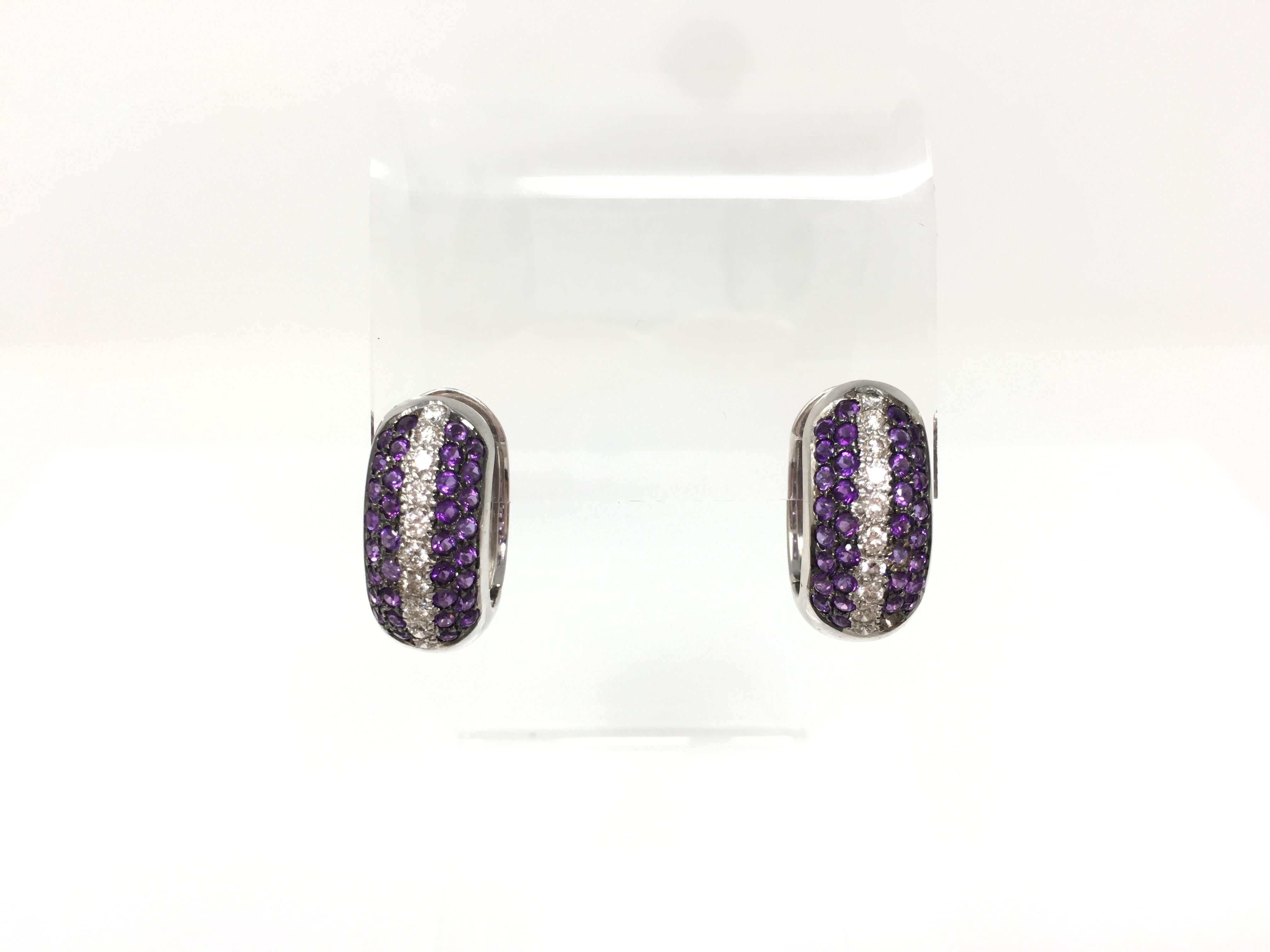 Amethyst, 18k white gold and diamond hoop earrings. The amethyst weigh 2.50 carat approx and diamond weigh 1 carat with GH color and VS clarity. These stylish and beautiful hoop earrings are hand custom made in 18 K white gold by moguldiam Inc. The
