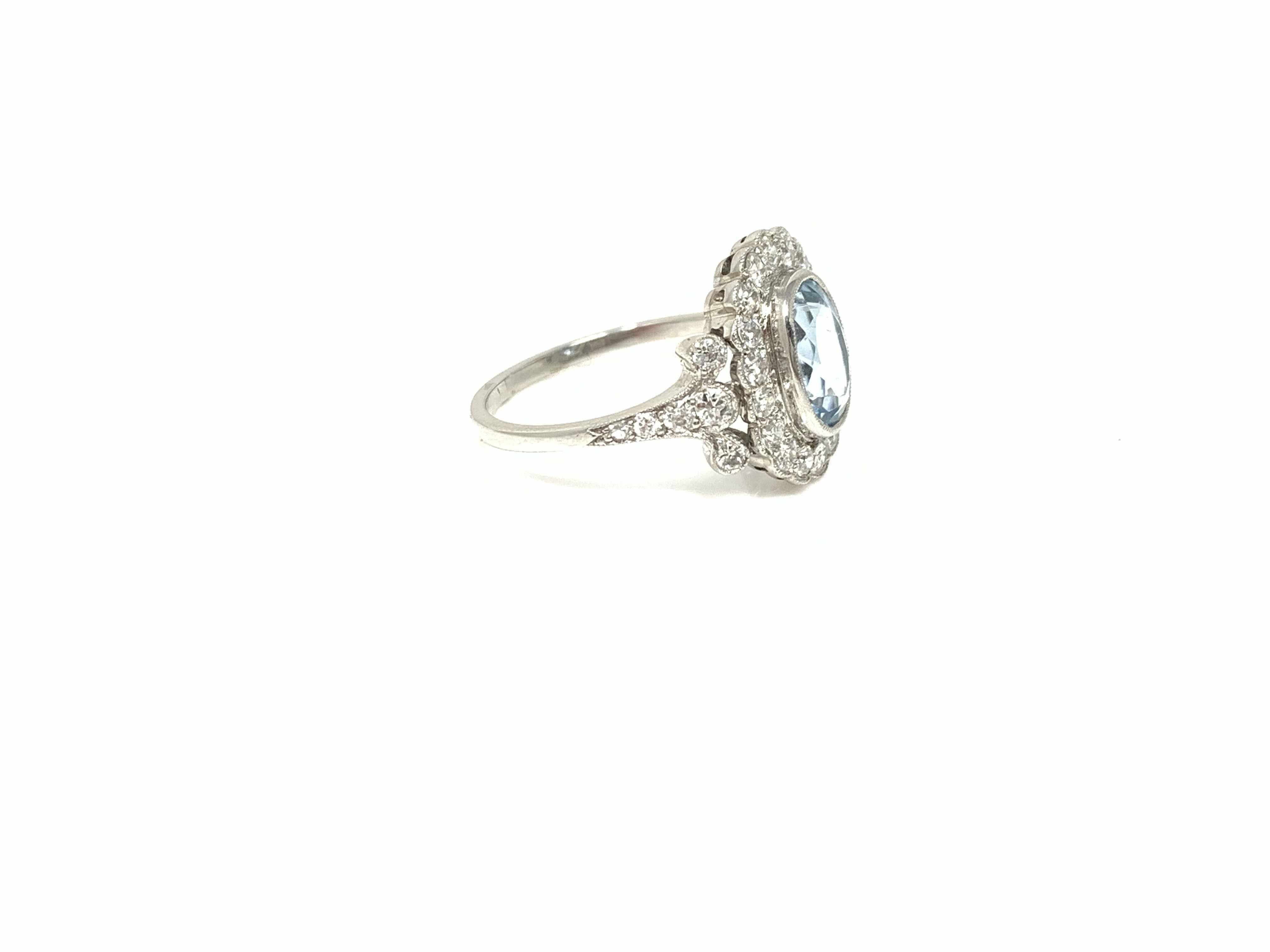 Art Deco White Round Brilliant Diamond and Aquamarine Ring in Platinum