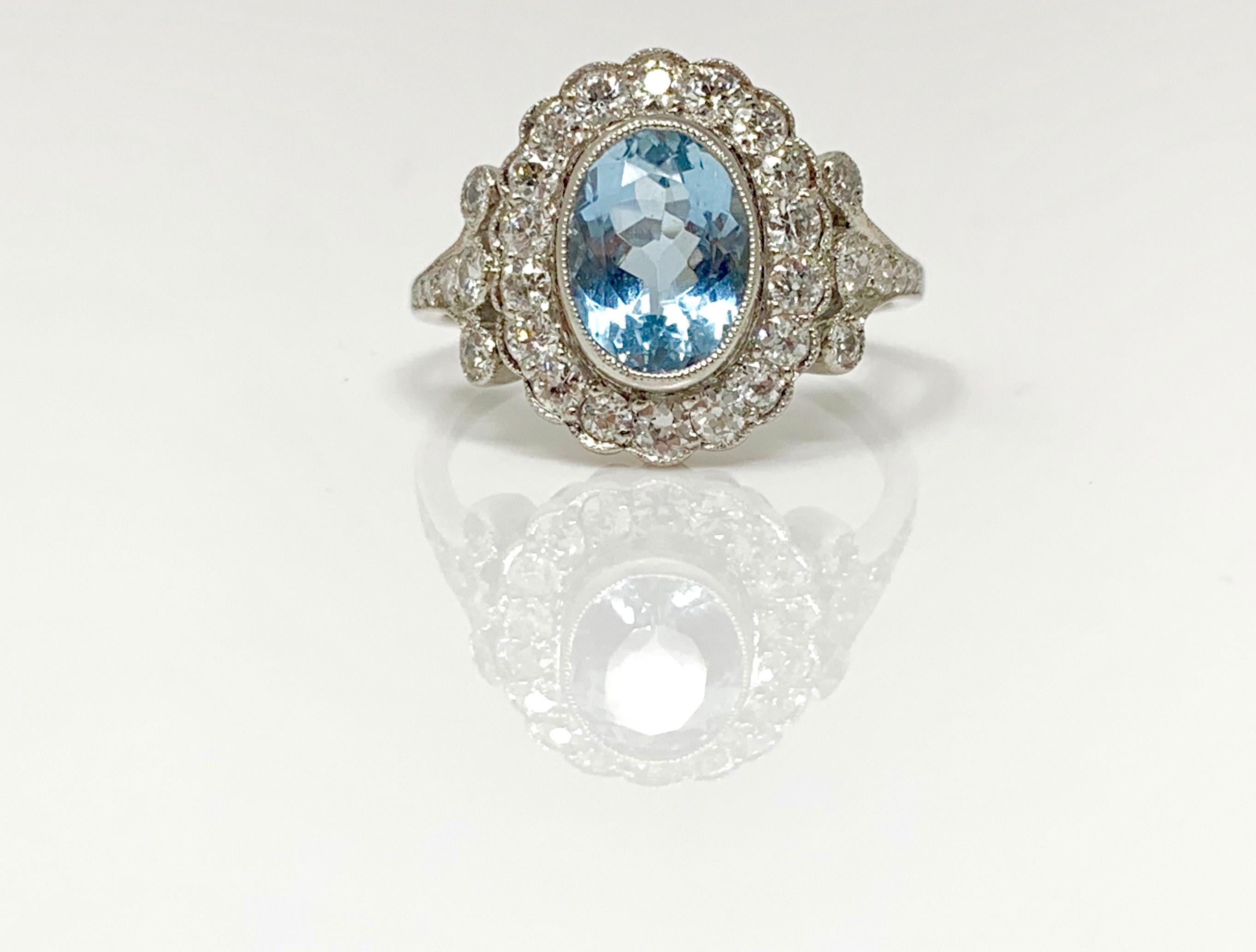 Women's White Round Brilliant Diamond and Aquamarine Ring in Platinum