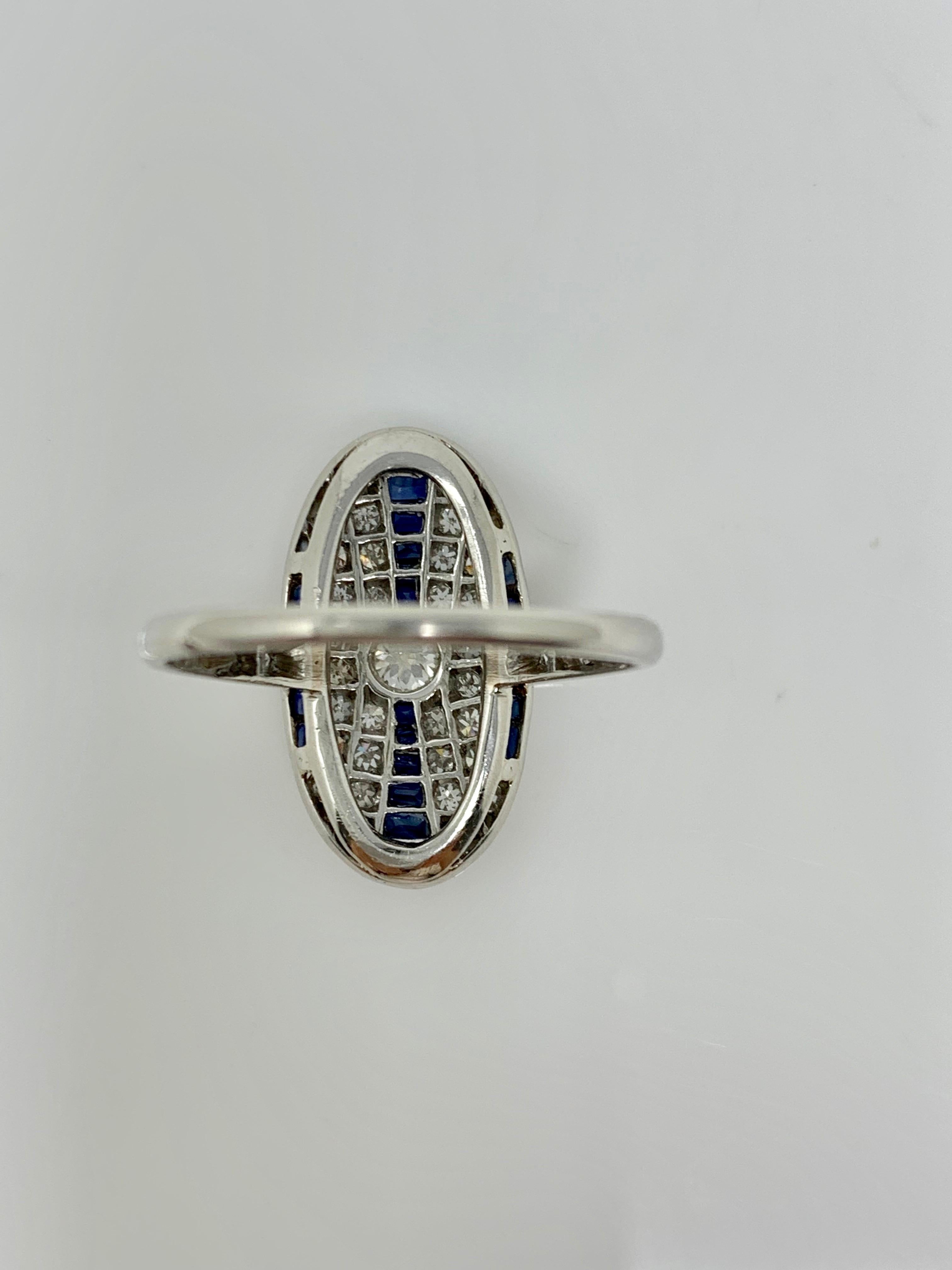 Round Cut White Round Brilliant Diamond and Blue Sapphire Ring in Platinum For Sale