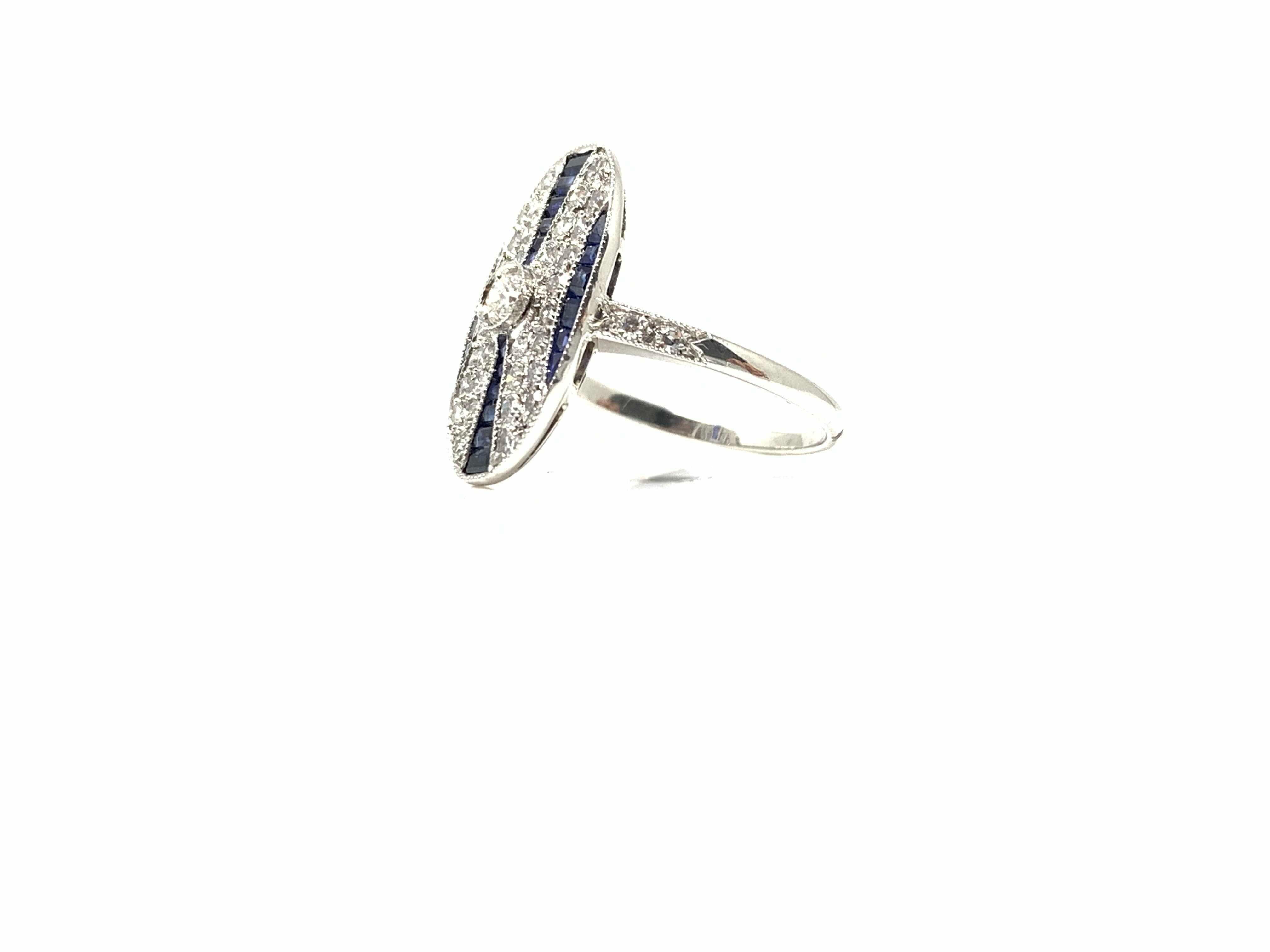 Women's White Round Brilliant Diamond and Blue Sapphire Ring in Platinum For Sale