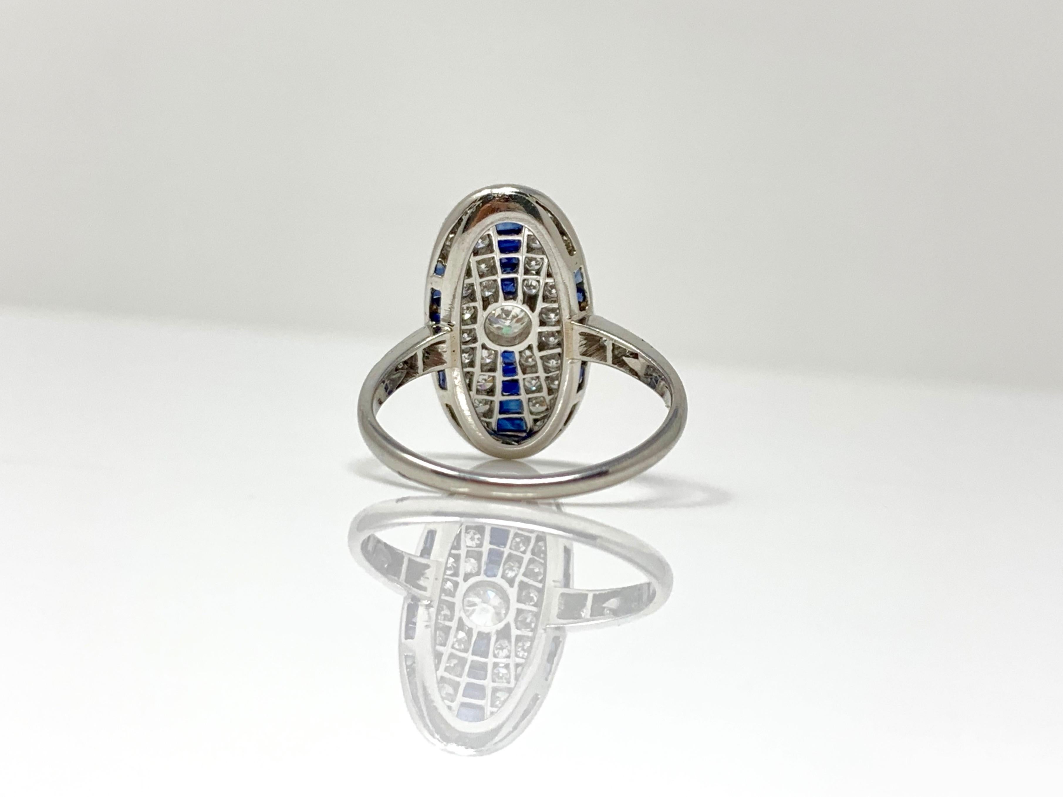 White Round Brilliant Diamond and Blue Sapphire Ring in Platinum For Sale 1