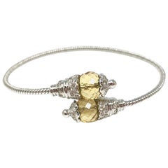 White Round Brilliant Diamond and Citrine Flexible Bangle in 18 Karat White Gold